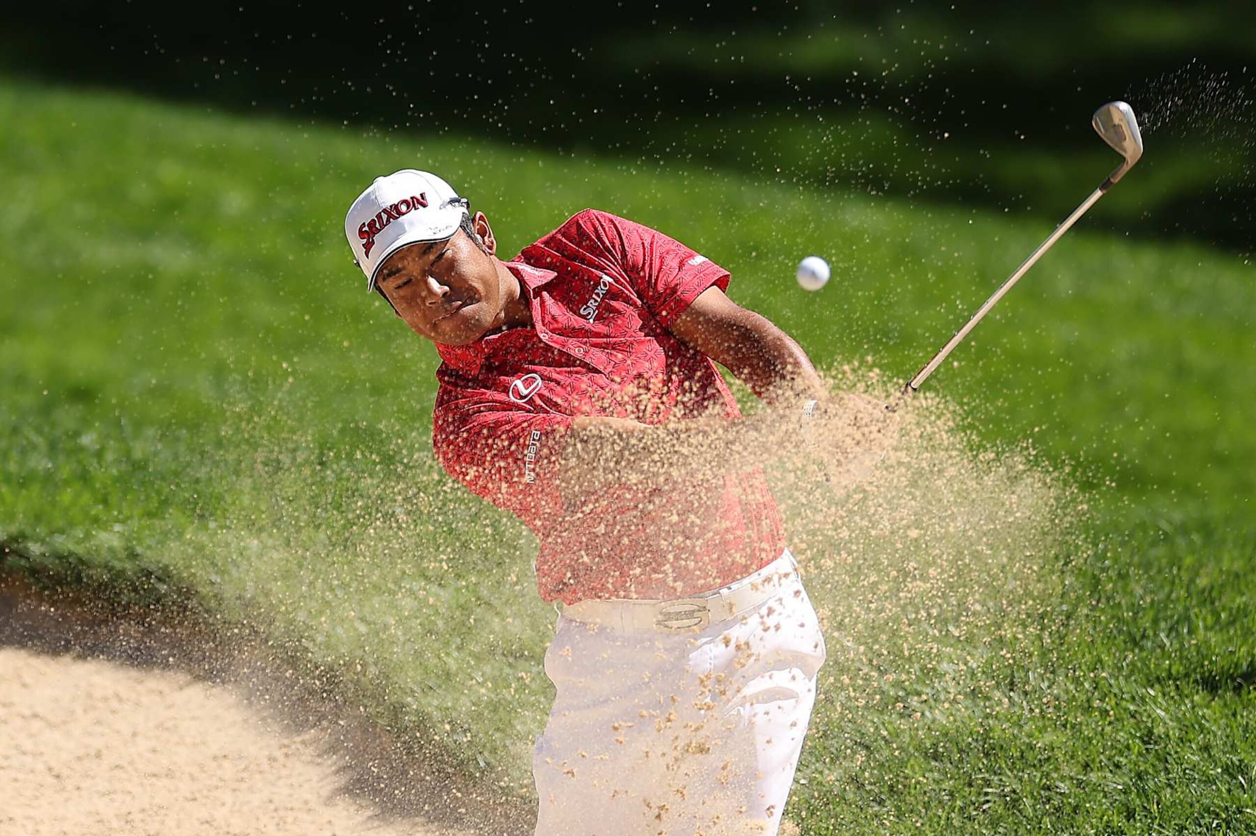 CASTLE ROCK, COLORADO - AUGUST 22: Hideki Matsuyama of Japan plays a shot from a bunker on the first hole during the first round of the BMW Championship at Castle Pines Golf Club on August 22, 2024 in Castle Rock, Colorado. (Photo by Christian Petersen/Getty Images)