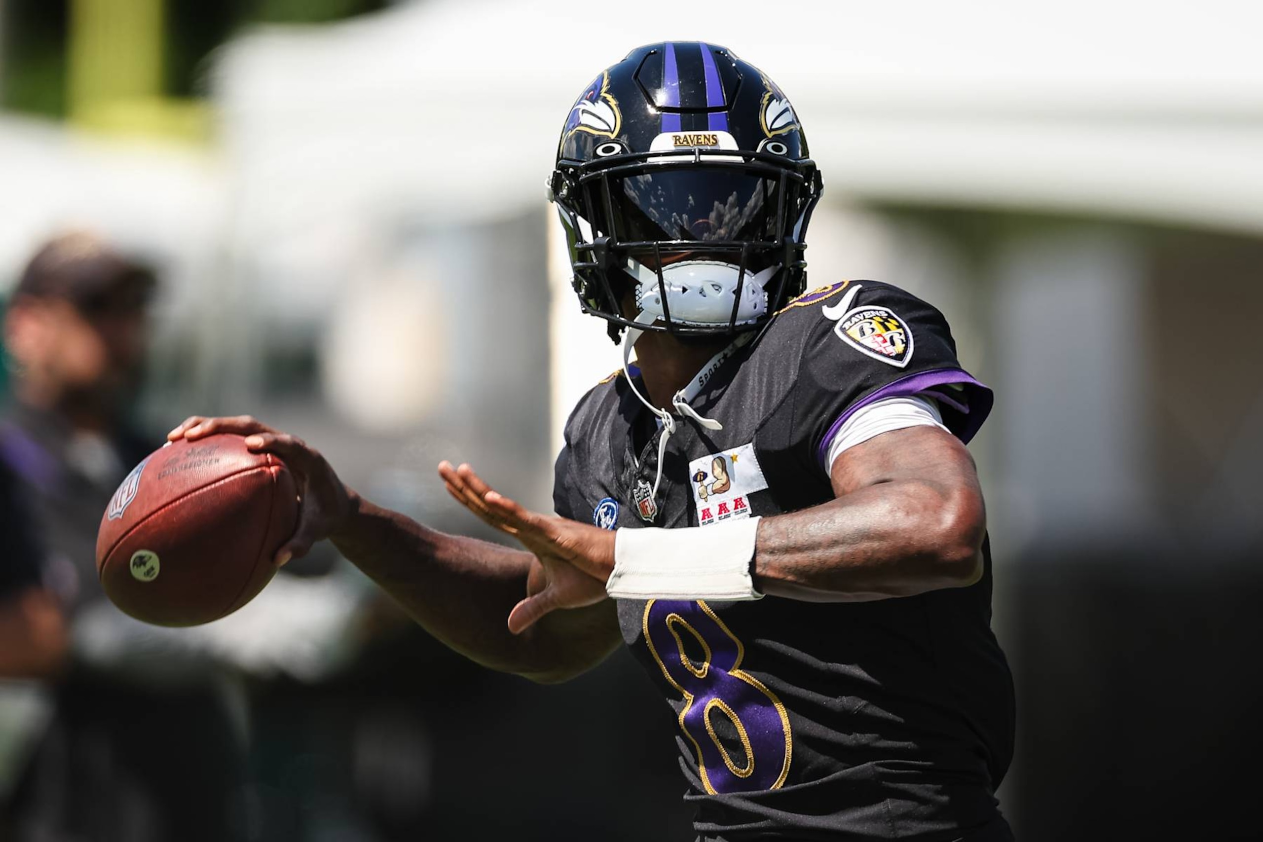 OWINGS MILLS, MD - AUGUST 12: Lamar Jackson #8 of the Baltimore Ravens attempts a pass during training camp at Under Armour Performance Center Baltimore Ravens on August 12, 2024 in Owings Mills, Maryland. (Photo by Scott Taetsch/Getty Images) OWINGS MILLS, MD - AUGUST 12: Lamar Jackson #8 of the Baltimore Ravens attempts a pass during training camp at Under Armour Performance Center Baltimore Ravens on August 12, 2024 in Owings Mills, Maryland. (Photo by Scott Taetsch/Getty Images)