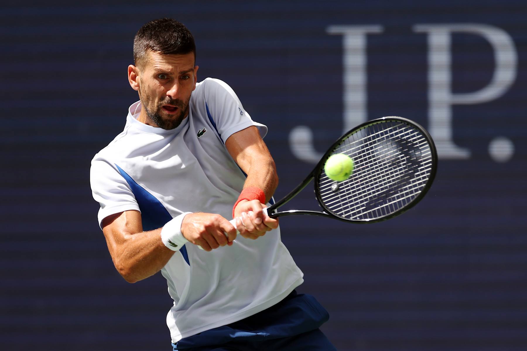 NEW YORK, NEW YORK - AUGUST 22: Novak Djokovic of Serbia returns a ball during a practice session prior to the start of the 2024 US Open at USTA Billie Jean King National Tennis Center on August 22, 2024 in the Flushing neighborhood of the Queens borough of New York City. (Photo by Sarah Stier/Getty Images)