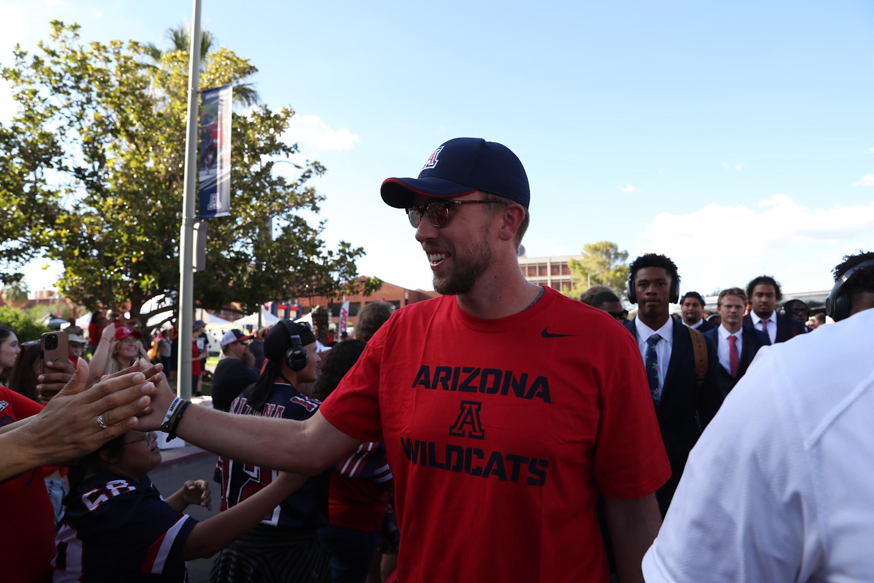 TUCSON, AZ - SEPTEMBER 02.  Arizona Wildcats alumni, Super Bowl MVP and honorary captiain Nick Foles interacts with fans, prior to a football game between the Northern Arizona University Lumberjacks and the University of Arizona Wildcats on September 2, 2023 at Arizona Stadium in Tucson, AZ.  (Photo by Christopher Hook/Icon Sportswire via Getty Images)