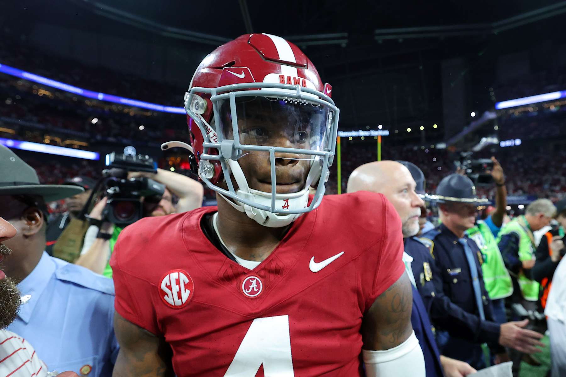 ATLANTA, GEORGIA - DECEMBER 02: Jalen Milroe #4 of the Alabama Crimson Tide celebrates after defeating the Georgia Bulldogs 27-24 in the SEC Championship at Mercedes-Benz Stadium on December 02, 2023 in Atlanta, Georgia. (Photo by Kevin C. Cox/Getty Images)