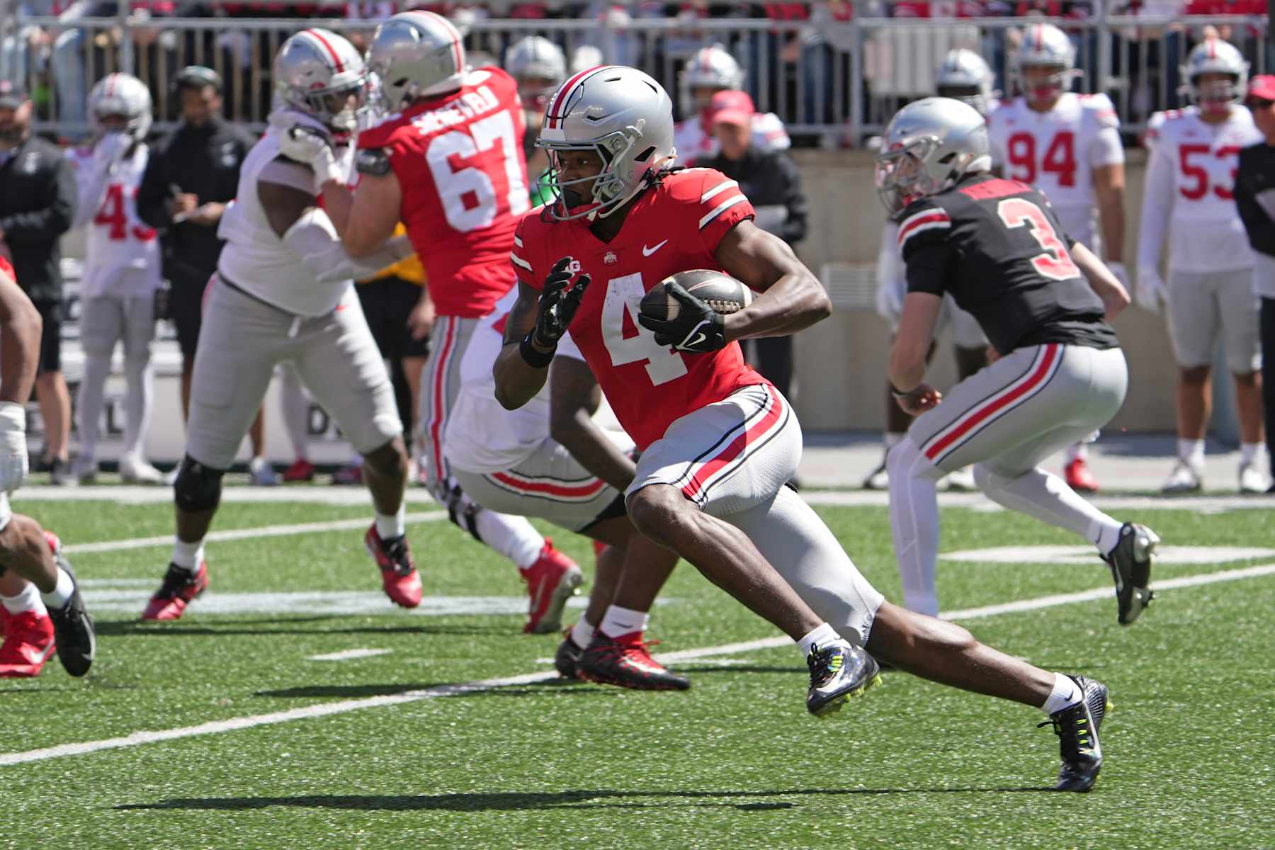 COLUMBUS, OH - APRIL 13: Ohio State Buckeyes wide receiver Jeremiah Smith (4) runs with the ball during the Ohio State Spring Game at Ohio Stadium in Columbus, Ohio on April 13, 2024. (Photo by Jason Mowry/Icon Sportswire via Getty Images)