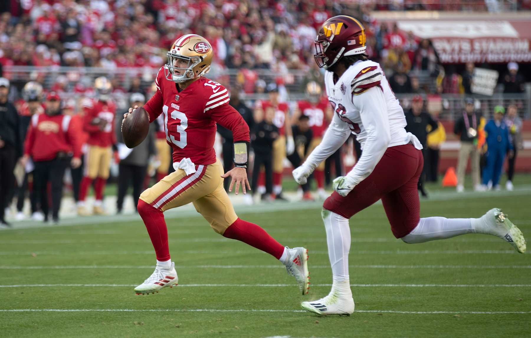 SANTA CLARA, CA - DECEMBER 24: Brock Purdy #13 of the San Francisco 49ers scrambles during the game against the Washington Commanders at Levi's Stadium on December 24, 2022 in Santa Clara, California. The 49ers defeated the Commanders 37-20. (Photo by Michael Zagaris/San Francisco 49ers/Getty Images)