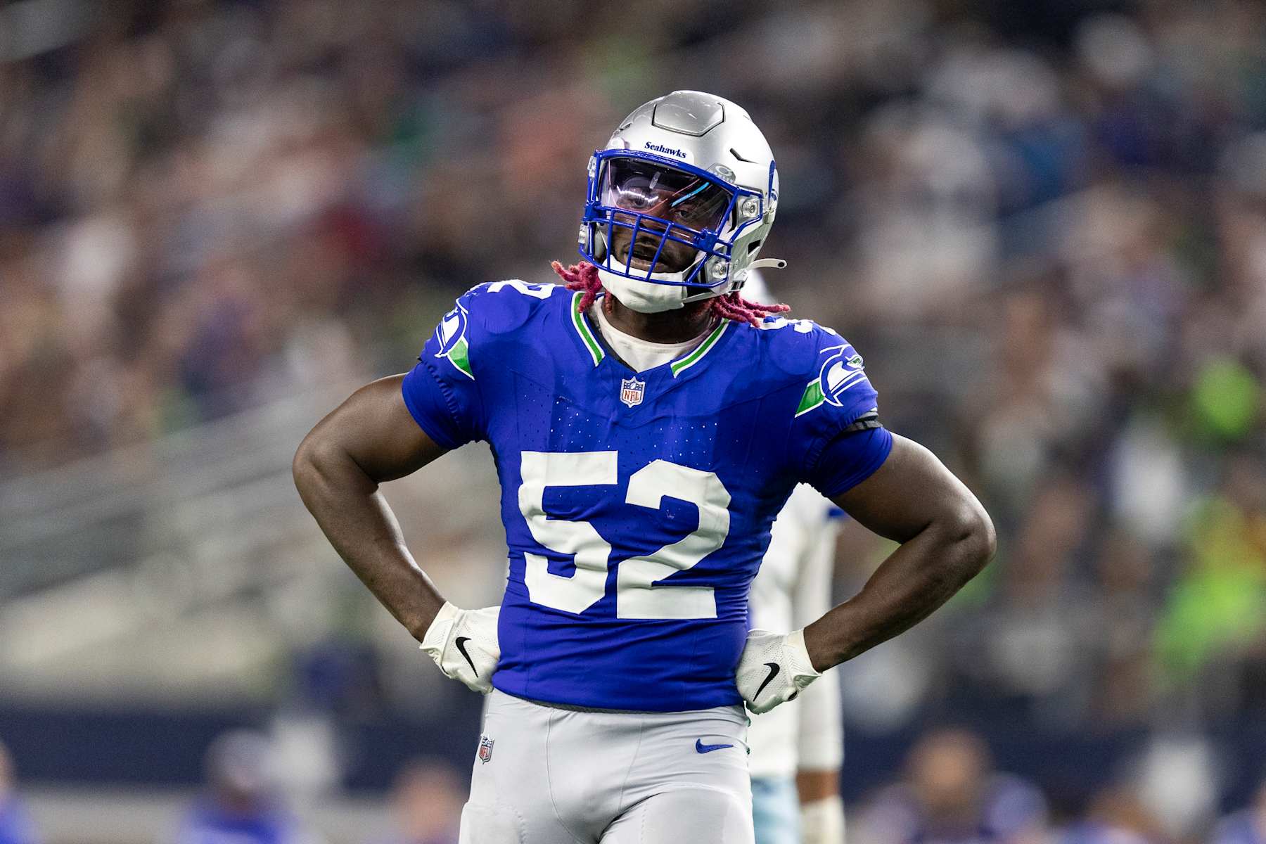 ARLINGTON, TEXAS - NOVEMBER 30: Darrell Taylor #52 of the Seattle Seahawks looks on during an NFL football game between the Dallas Cowboys and the Seattle Seahawks at AT&T Stadium on November 30, 2023 in Arlington, Texas. (Photo by Michael Owens/Getty Images)