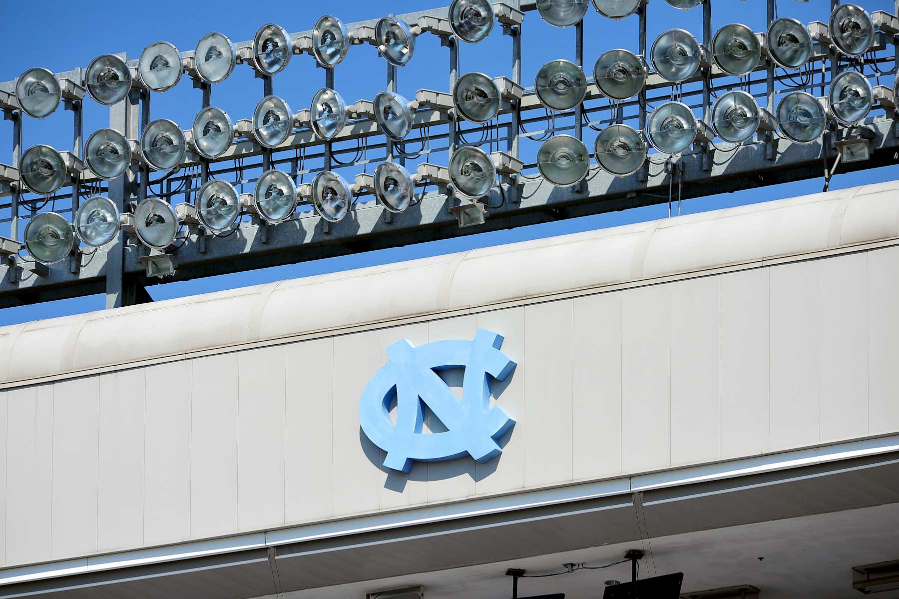 CHAPEL HILL, NC - OCTOBER 06: The North Carolina Tar Heels logo is seen near the top of Kenan Stadium during a game between the Virginia Tech Hokies and the North Carolina Tar Heels on October 6, 2012 at Kenan Stadium in Chapel Hill, North Carolina.  (Photo by Lance King/Getty Images)