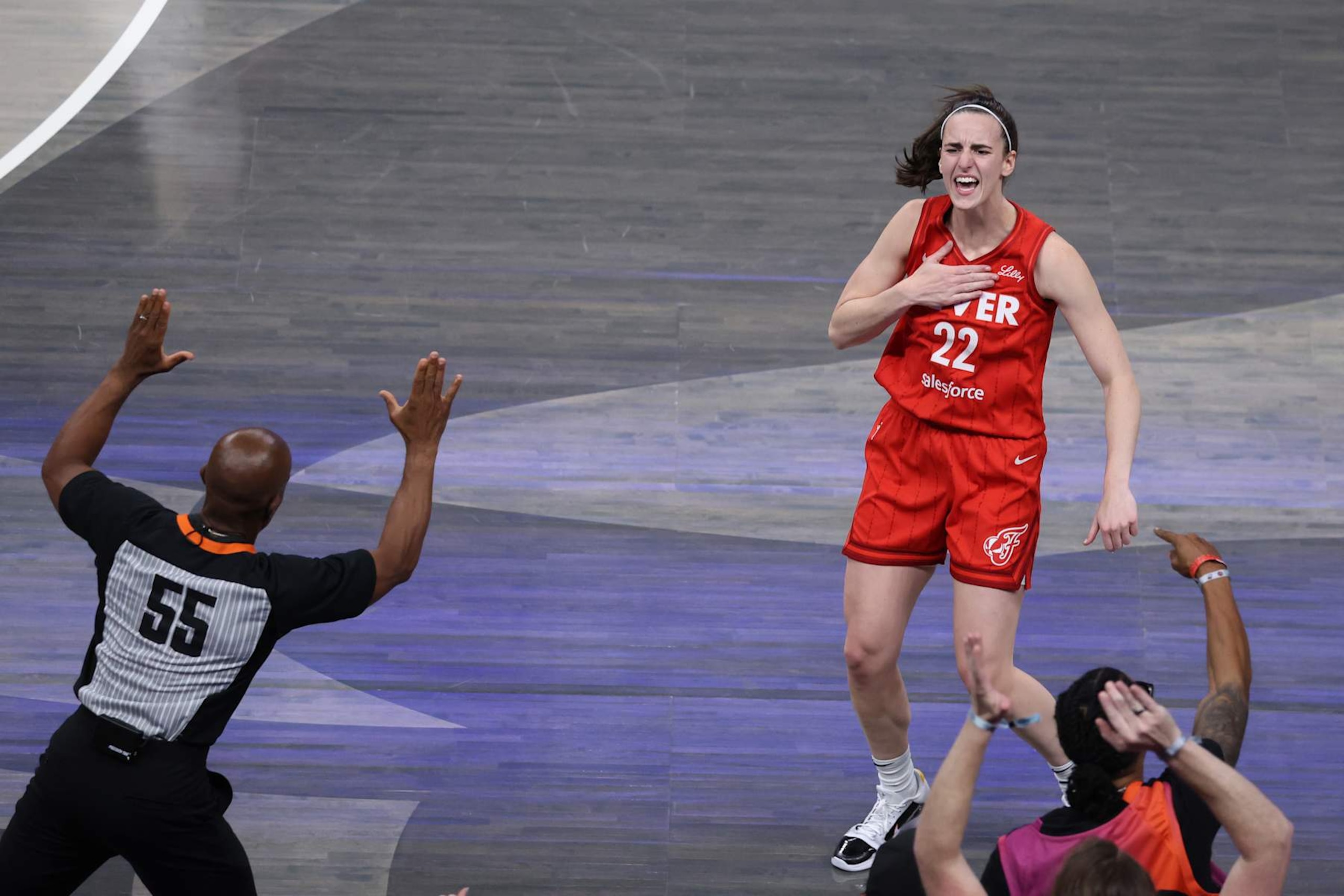 INDIANAPOLIS, IN - AUGUST 16: Indiana Fever guard Caitlin Clark (22) reacts to making a 3 point shot against the Phoenix Mercury at Gainbridge Fieldhouse on August 16, 2024 in Indianapolis, Indiana. (Photo by Brian Spurlock/Icon Sportswire via Getty Images) INDIANAPOLIS, IN - AUGUST 16: Indiana Fever guard Caitlin Clark (22) reacts to making a 3 point shot against the Phoenix Mercury at Gainbridge Fieldhouse on August 16, 2024 in Indianapolis, Indiana. (Photo by Brian Spurlock/Icon Sportswire via Getty Images)