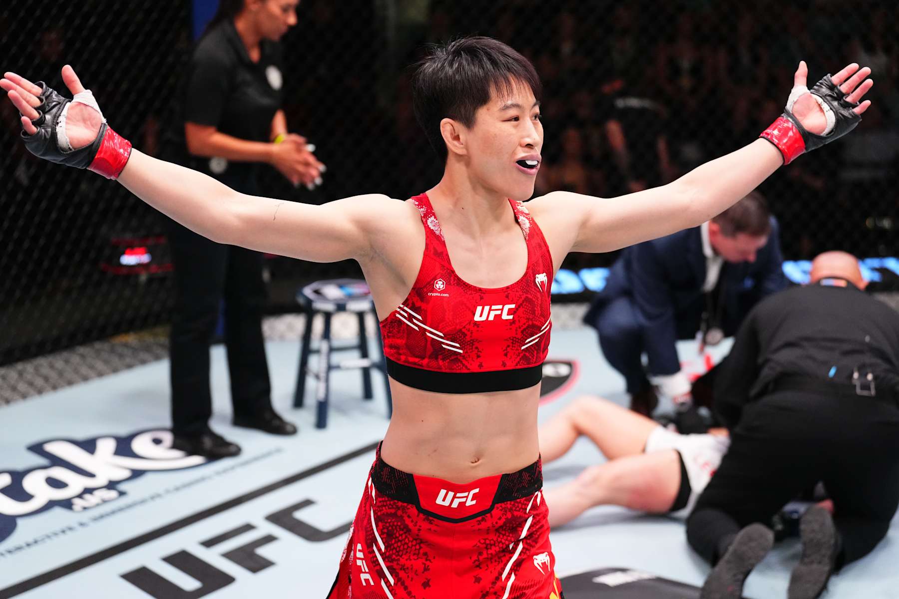 LAS VEGAS, NEVADA - AUGUST 24: Wang Cong of China reacts after her knockout victory against Victoria Leonardo in a flyweight fight during the UFC Fight Night event at UFC APEX on August 24, 2024 in Las Vegas, Nevada. (Photo by Chris Unger/Zuffa LLC)