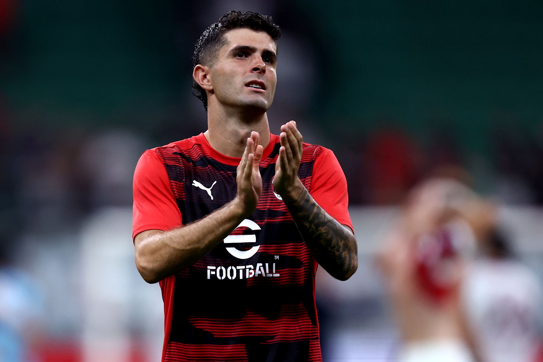 STADIO GIUSEPPE MEAZZA, MILANO, ITALY - 2024/08/17: Christian Pulisic of Ac Milan  greets the fans at the end of the Serie A football match between Ac Milan and Torino Fc. The match ends in a tie 2-2. (Photo by Marco Canoniero/LightRocket via Getty Images)