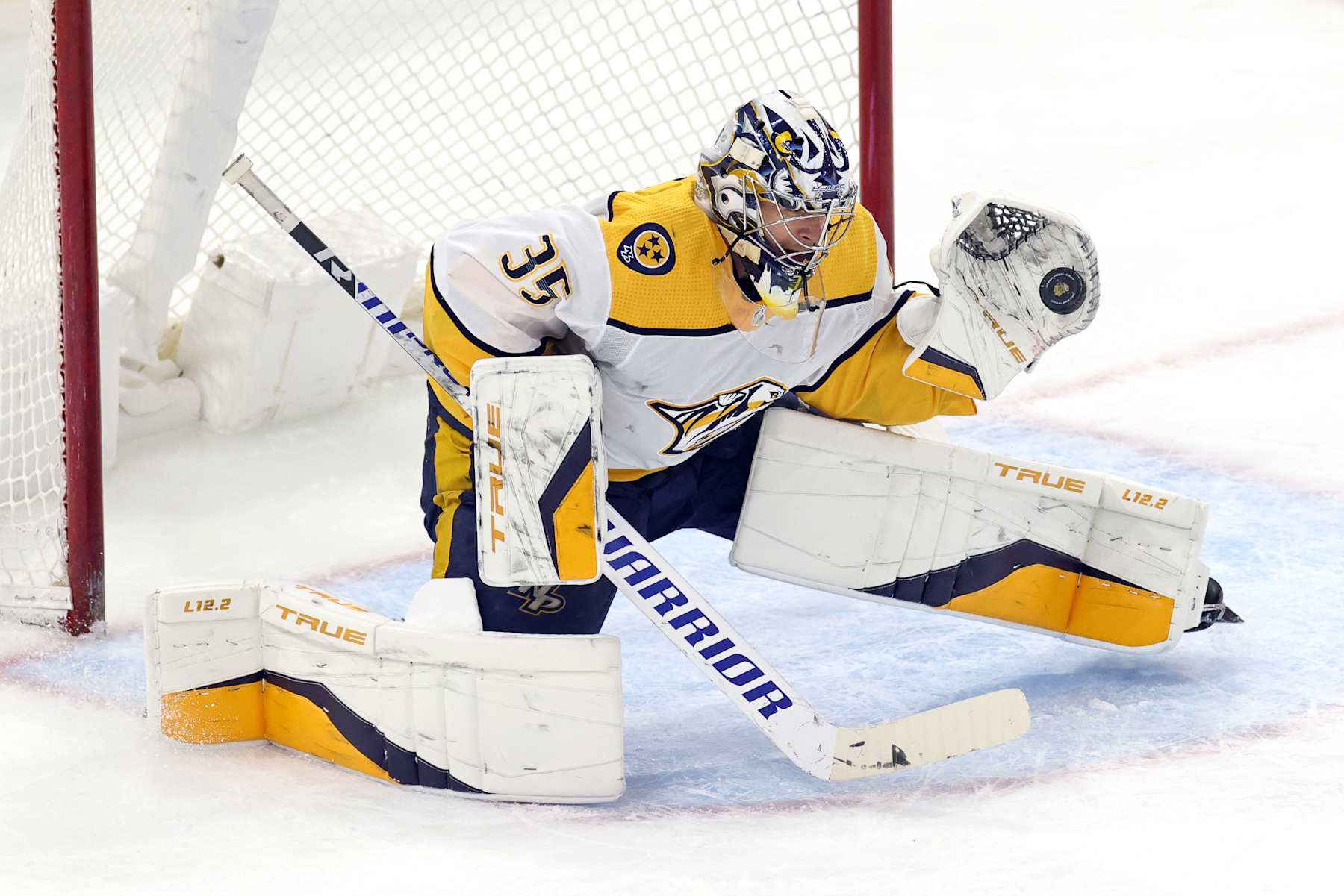 CHICAGO, IL - MARCH 28: Nashville Predators goaltender Pekka Rinne (35) makes a glove save in action during a game between the Nashville Predators and the Chicago Blackhawks on March 28, 2021 at the United Center in Chicago, IL. (Photo by Robin Alam/Icon Sportswire via Getty Images)