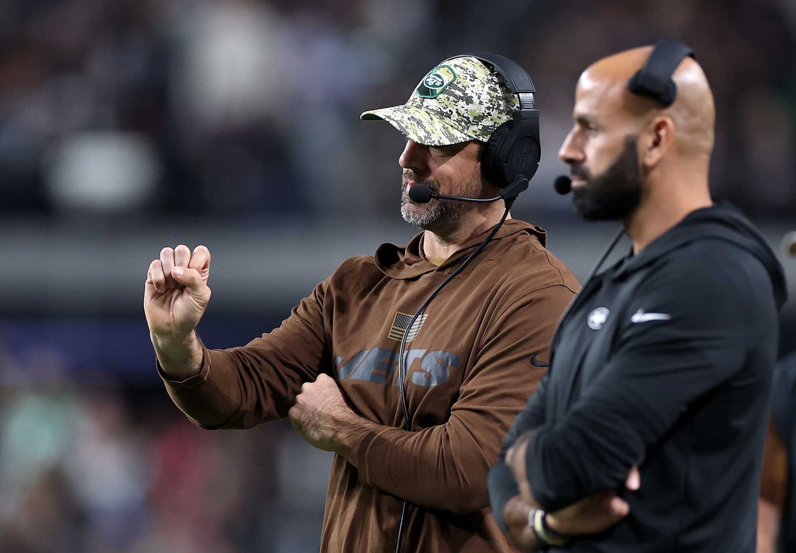 LAS VEGAS, NEVADA - NOVEMBER 12:  Quarterback Aaron Rodgers #8 of the New York Jets talks with head coach Robert Saleh on the sidelines during the 1st half of the game against the Las Vegas Raiders at Allegiant Stadium on November 12, 2023 in Las Vegas, Nevada. (Photo by Sean M. Haffey/Getty Images)
