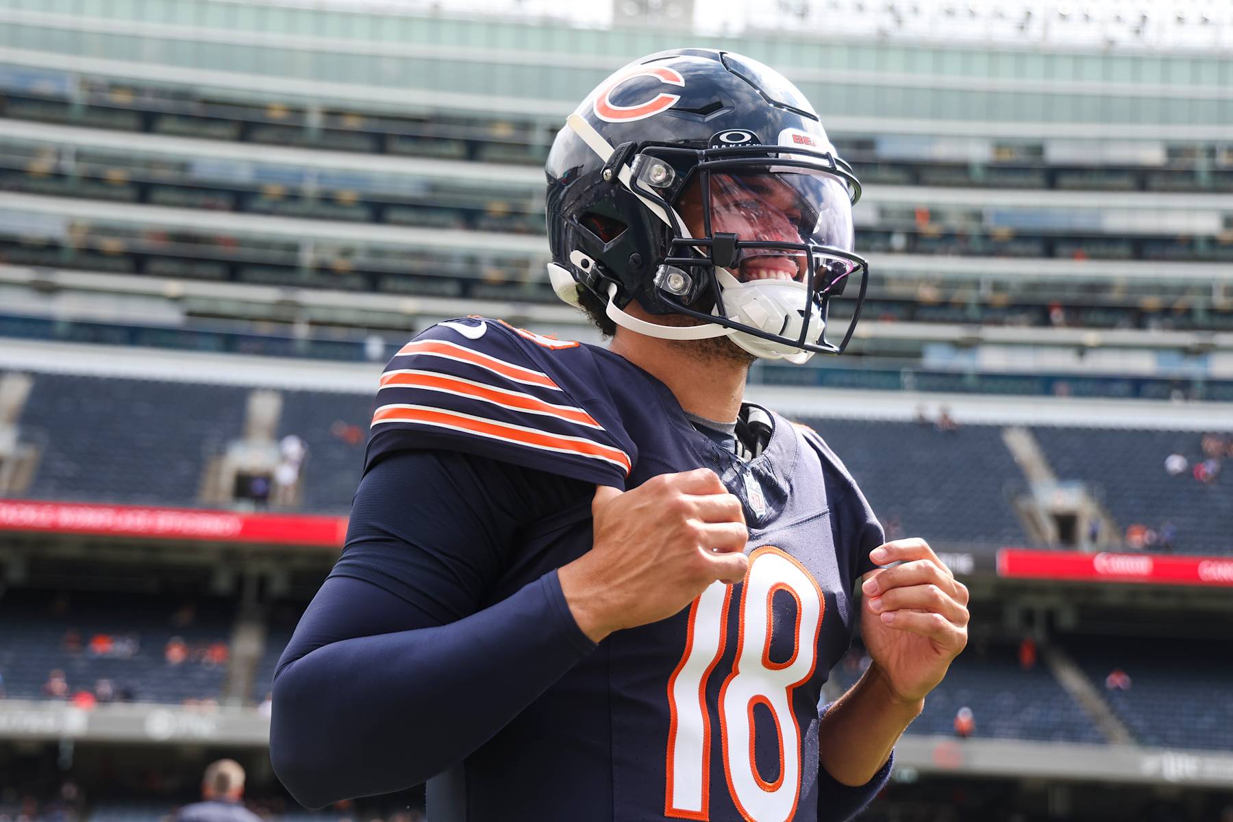 CHICAGO, IL - AUGUST 17: Caleb Williams #18 of the Chicago Bears warms up prior to an NFL football game against the Cincinnati Bengals at Solider Field on August 17, 2024 in Chicago, Illinois. (Photo by Perry Knotts/Getty Images)