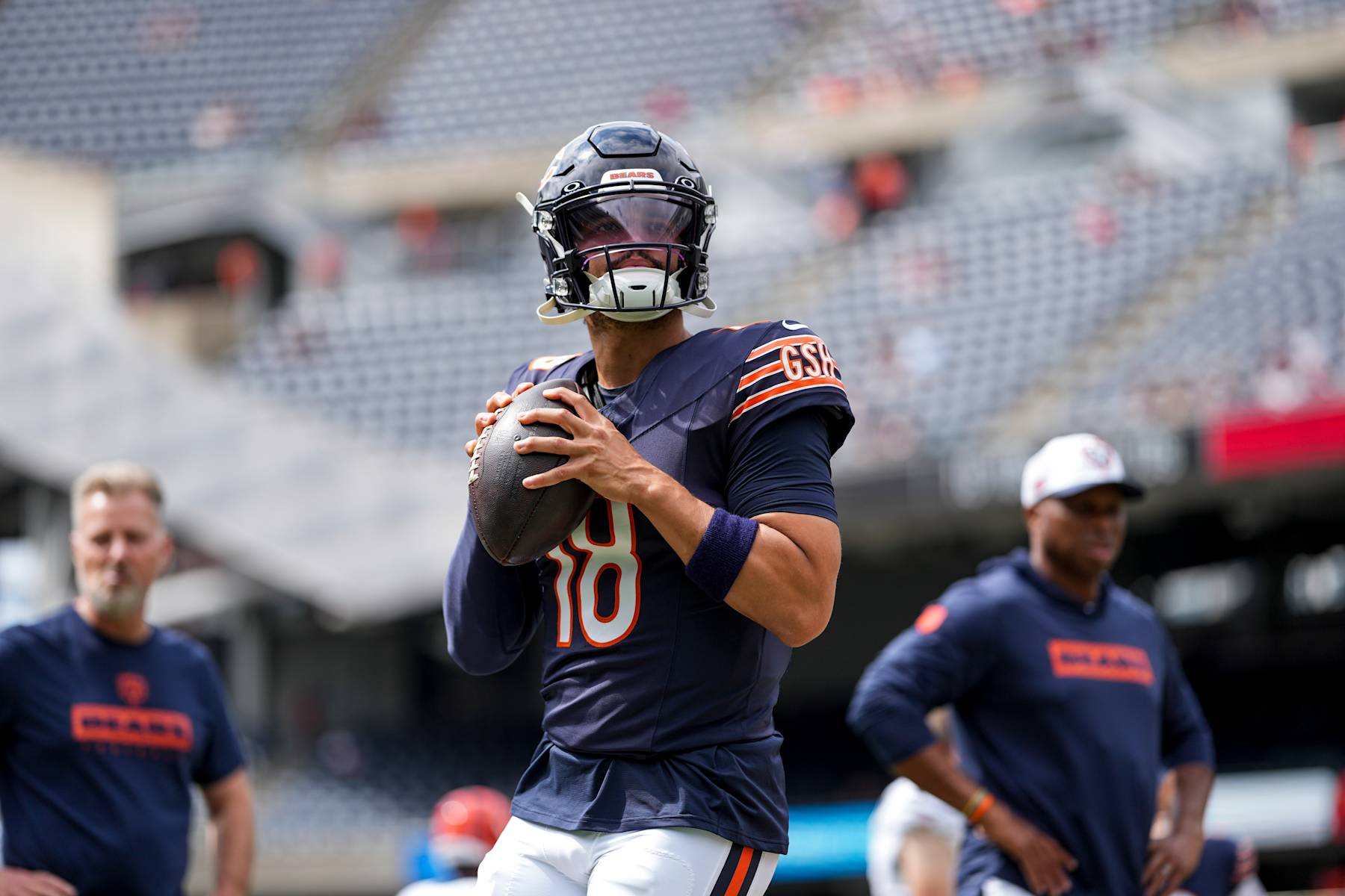 CHICAGO, IN - AUGUST 17: Caleb Williams #18 of the Chicago Bears warms up prior to an NFL preseason football game against the Cincinnati Bengals, at Soldier Field on August 17, 2024 in Chicago, Illinois. (Photo by Todd Rosenberg/Getty Images)