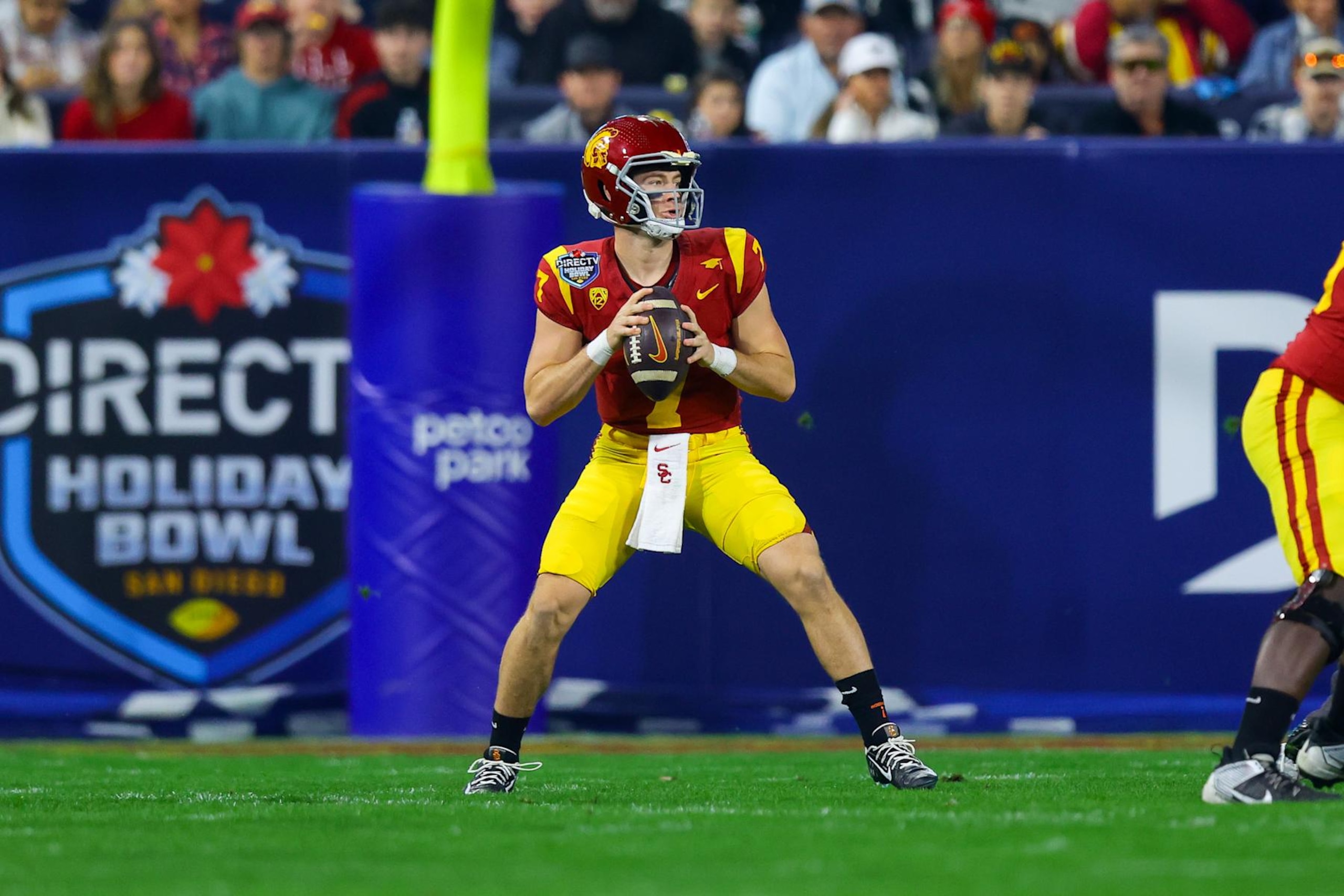 SAN DIEGO, CA - DECEMBER 27: USC Trojans quarterback Miller Moss (7) looks to throw the ball during the Directv Holiday Bowl football game between the Louisville Cardinals and the USC Trojans on December 27, 2023, at Petco Park in San Diego, CA. (Photo by Jordon Kelly/Icon Sportswire via Getty Images)
