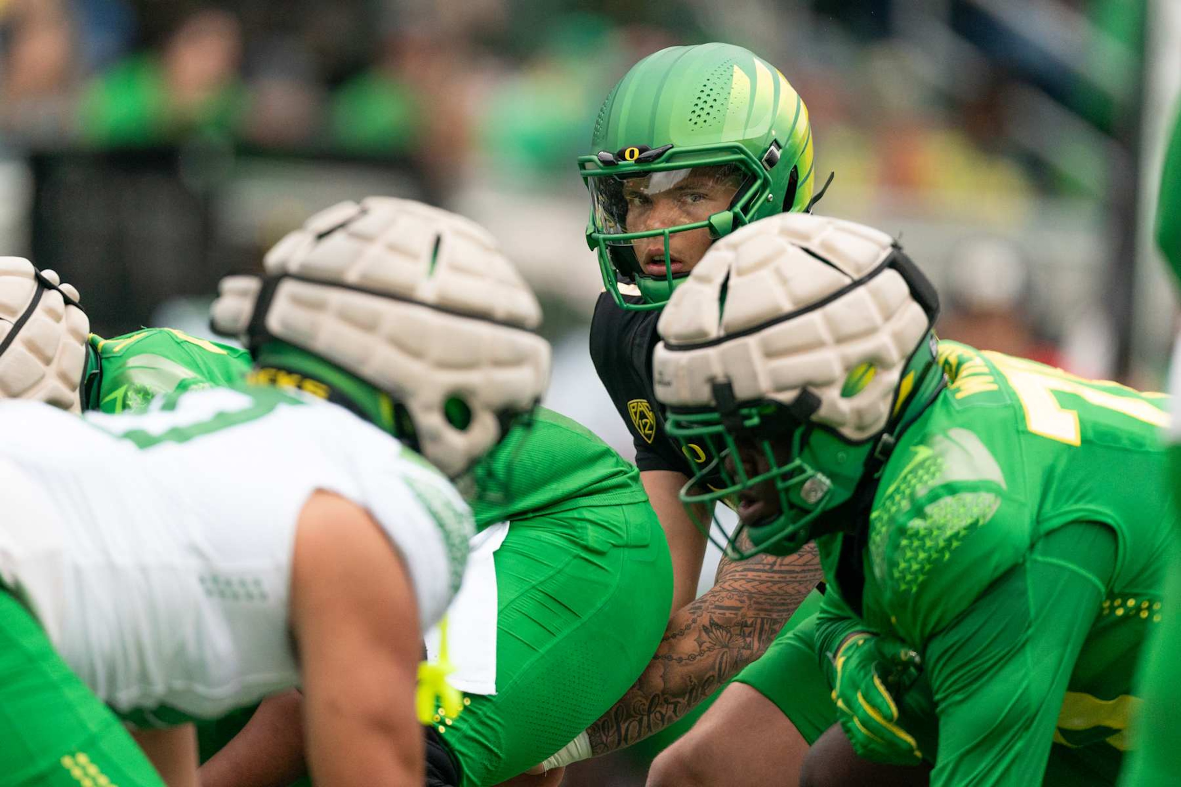 EUGENE, OREGON - APRIL 27:  Quarterback Dillon Gabriel #8 of the Oregon Ducks looks to receive the ball during the second quarter of the Oregon Ducks Spring Football Game at Autzen Stadium on April 27, 2024 in Eugene, Oregon. (Photo by Ali Gradischer/Getty Images)