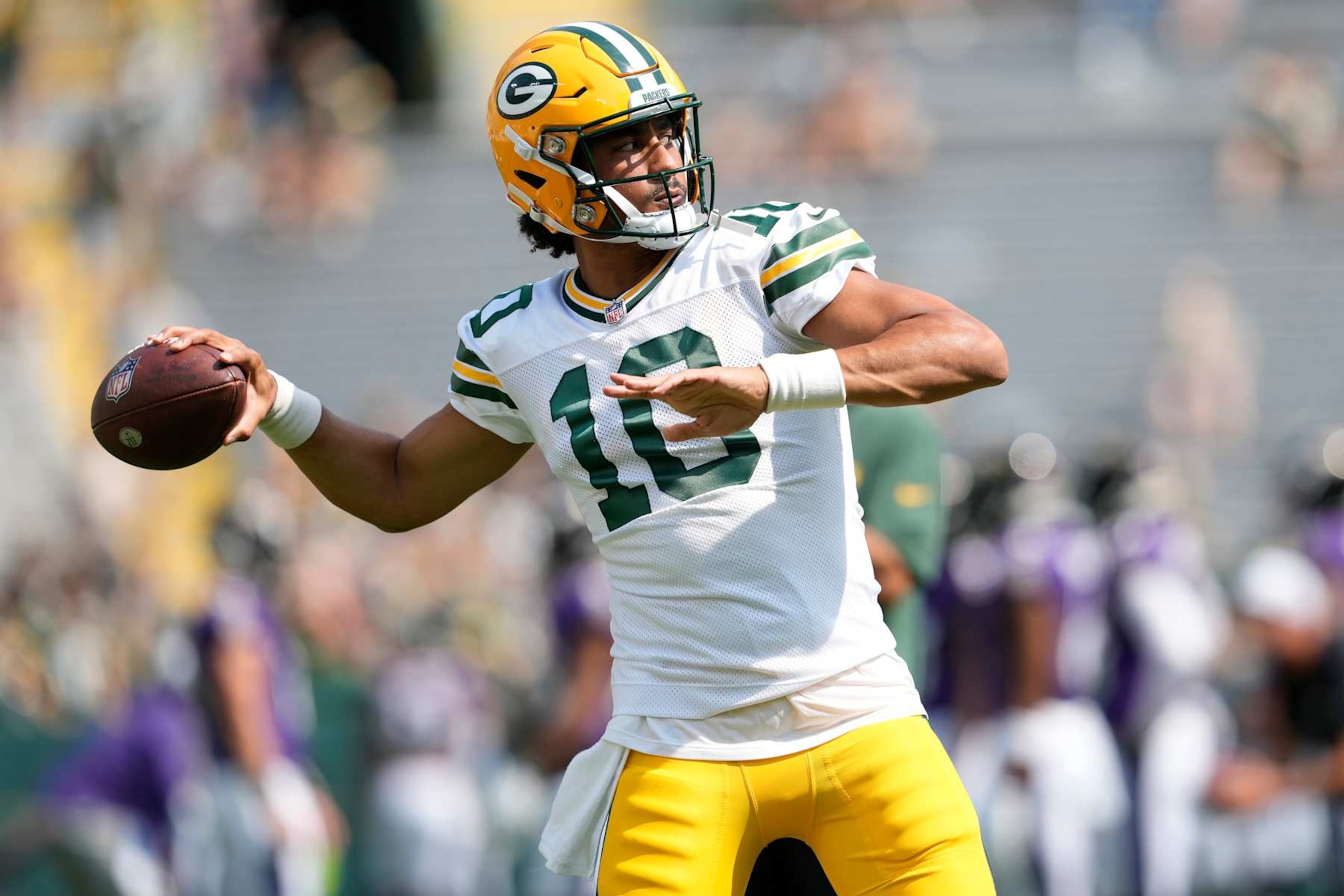 GREEN BAY, WISCONSIN - AUGUST 24: Jordan Love #10 of the Green Bay Packers warms up before a preseason game against the Baltimore Ravens at Lambeau Field on August 24, 2024 in Green Bay, Wisconsin. (Photo by Patrick McDermott/Getty Images)