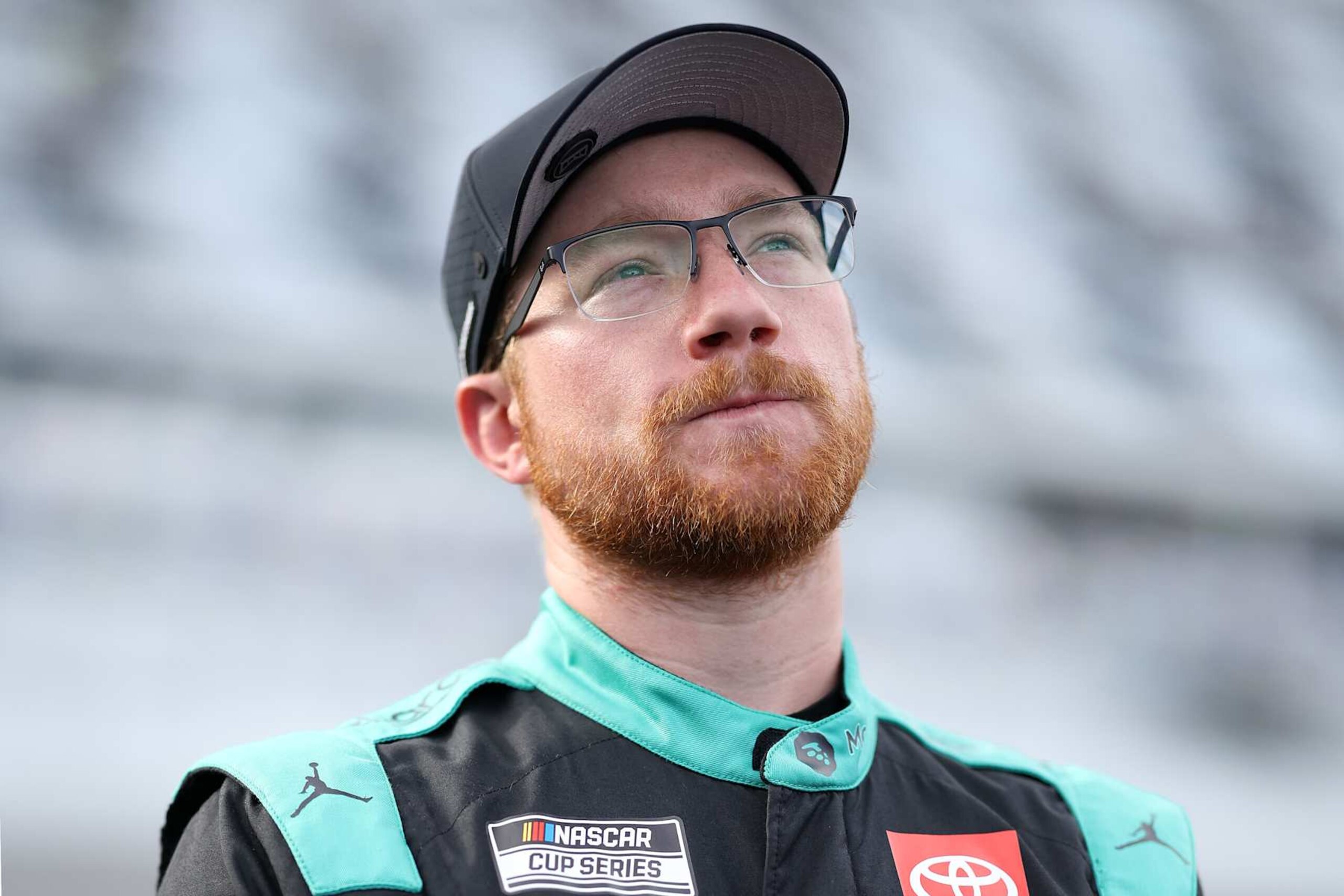 DAYTONA BEACH, FLORIDA - AUGUST 23: Tyler Reddick, driver of the #45 MoneyLion Toyota, looks on during qualifying for the NASCAR Cup Series Coke Zero Sugar 400 at Daytona International Speedway on August 23, 2024 in Daytona Beach, Florida. (Photo by James Gilbert/Getty Images)