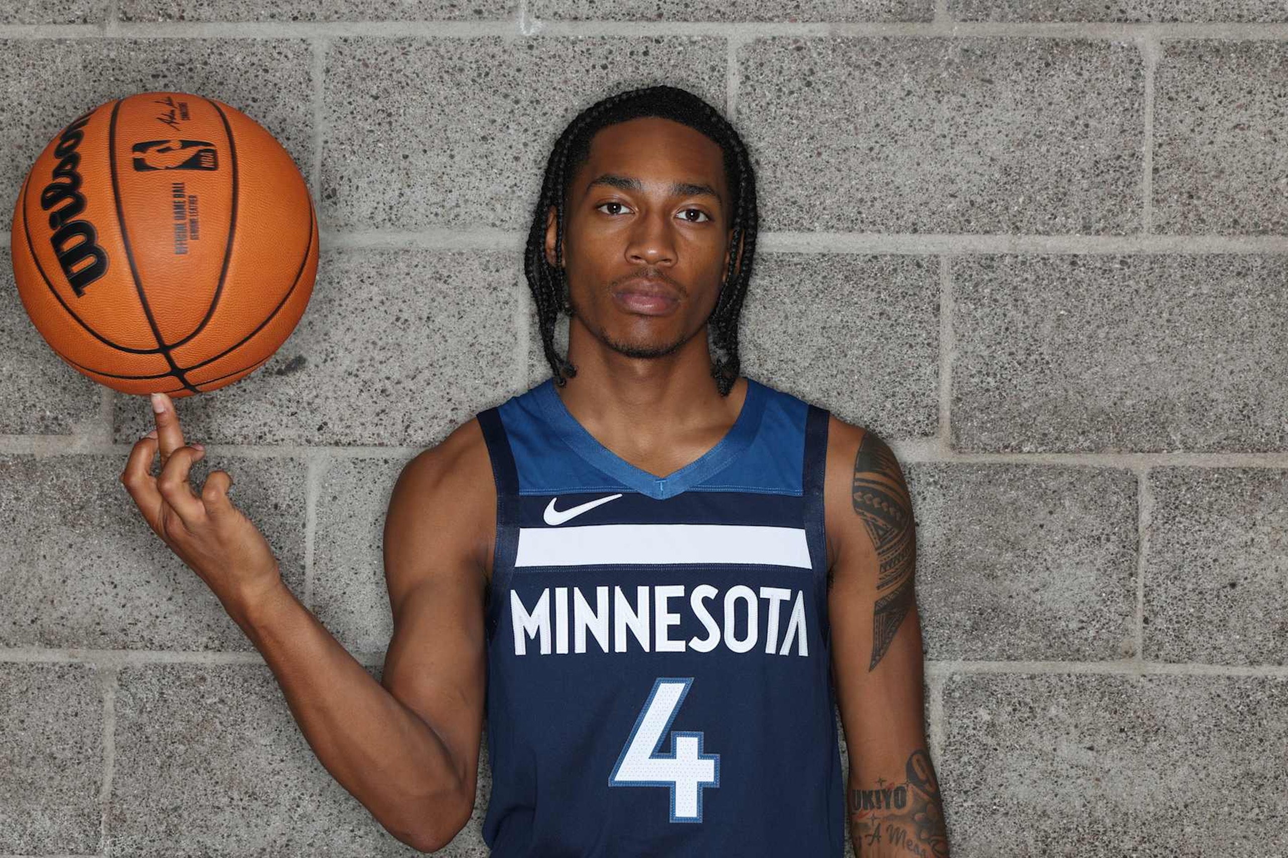 LAS VEGAS, NV - JULY 17: Rob Dillingham #4 of the Minnesota Timberwolves poses for a portrait during the 2024 NBA Rookie Photo Shoot on July 17, 2024 at the University of Nevada, Las Vegas campus in Las Vegas, Nevada. NOTE TO USER: User expressly acknowledges and agrees that, by downloading and/or using this Photograph, user is consenting to the terms and conditions of the Getty Images License Agreement. Mandatory Copyright Notice: Copyright 2024 NBAE (Photo by David Sherman/NBAE via Getty Images)