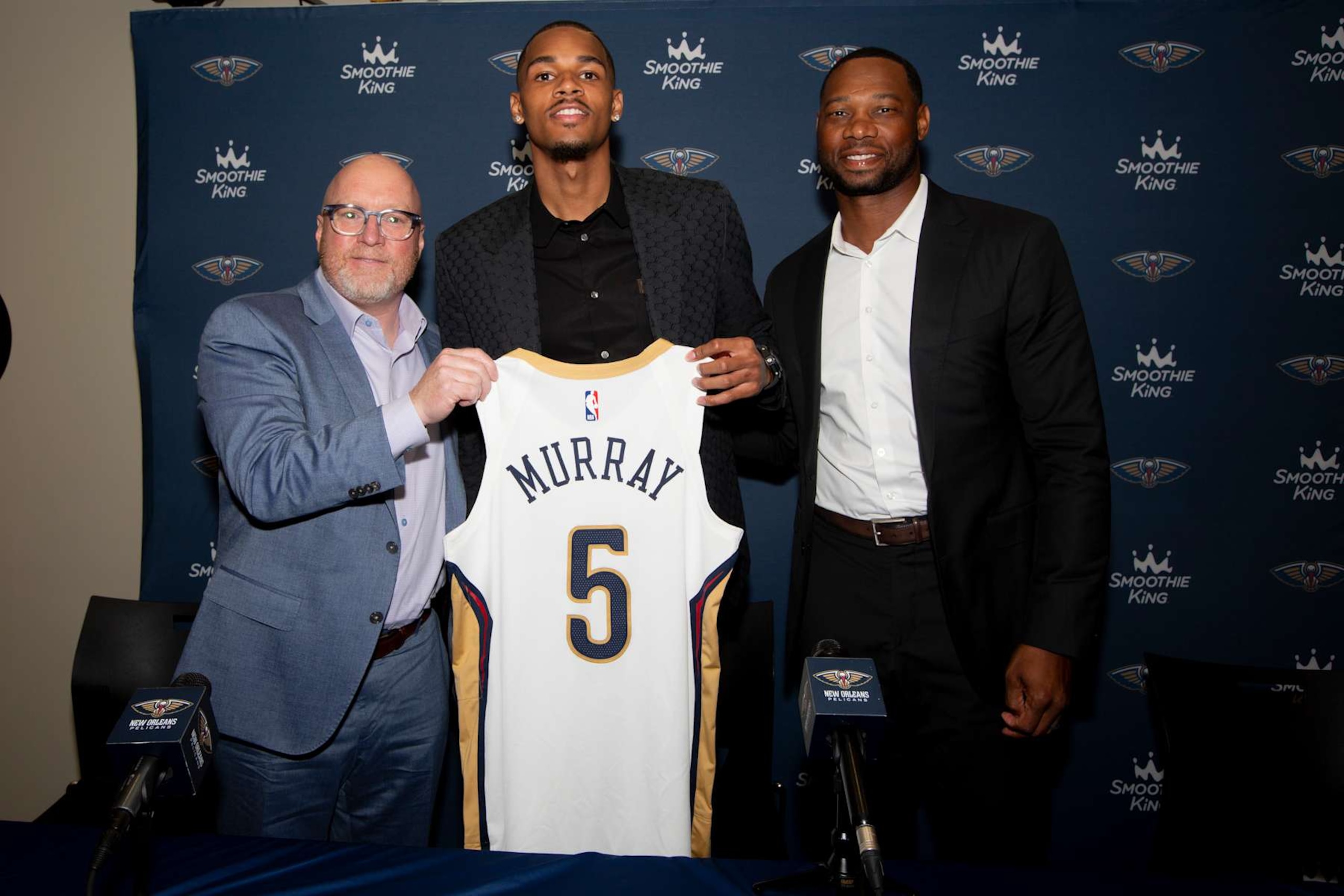 NEW ORLEANS, LA - July 9, 2024: Dejounte Murray #5 of the New Orleans Pelicans poses for pictures during the New Orleans Pelicans introductory press conference at Ochsner Sports Performance Center in Metairie, Louisiana. NOTE TO USER: User expressly acknowledges and agrees that, by downloading and or using this Photograph, user is consenting to the terms and conditions of the Getty Images License Agreement. Mandatory Copyright Notice: Copyright 2023 NBAE (Photo by Derick Hingle/NBAE via Getty Images)