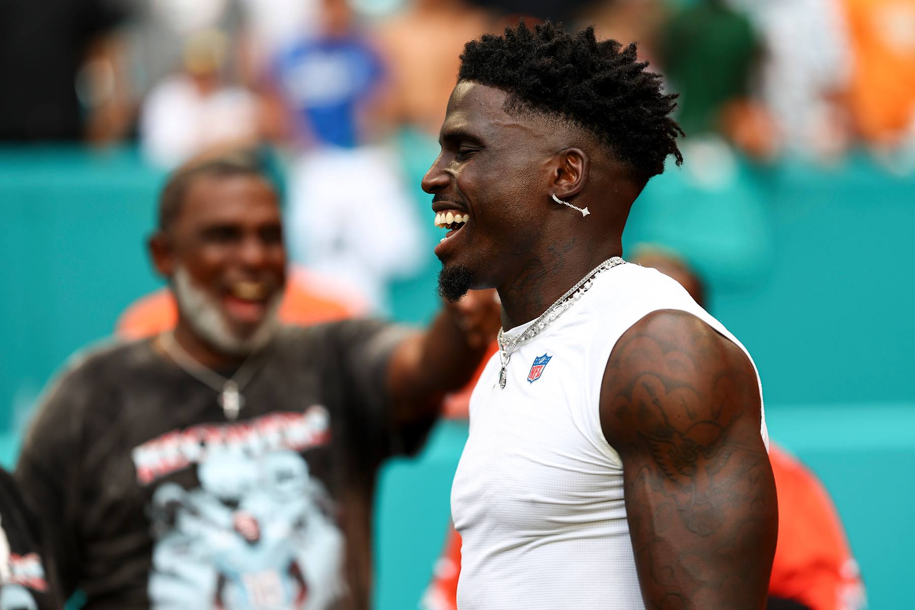 MIAMI GARDENS, FL - AUGUST 17: Tyreek Hill #10 of the Miami Dolphins smiles prior to an NFL preseason football game against the Washington Commanders at Hard Rock Stadium on August 17, 2024 in Miami Gardens, FL. (Photo by Kevin Sabitus/Getty Images)