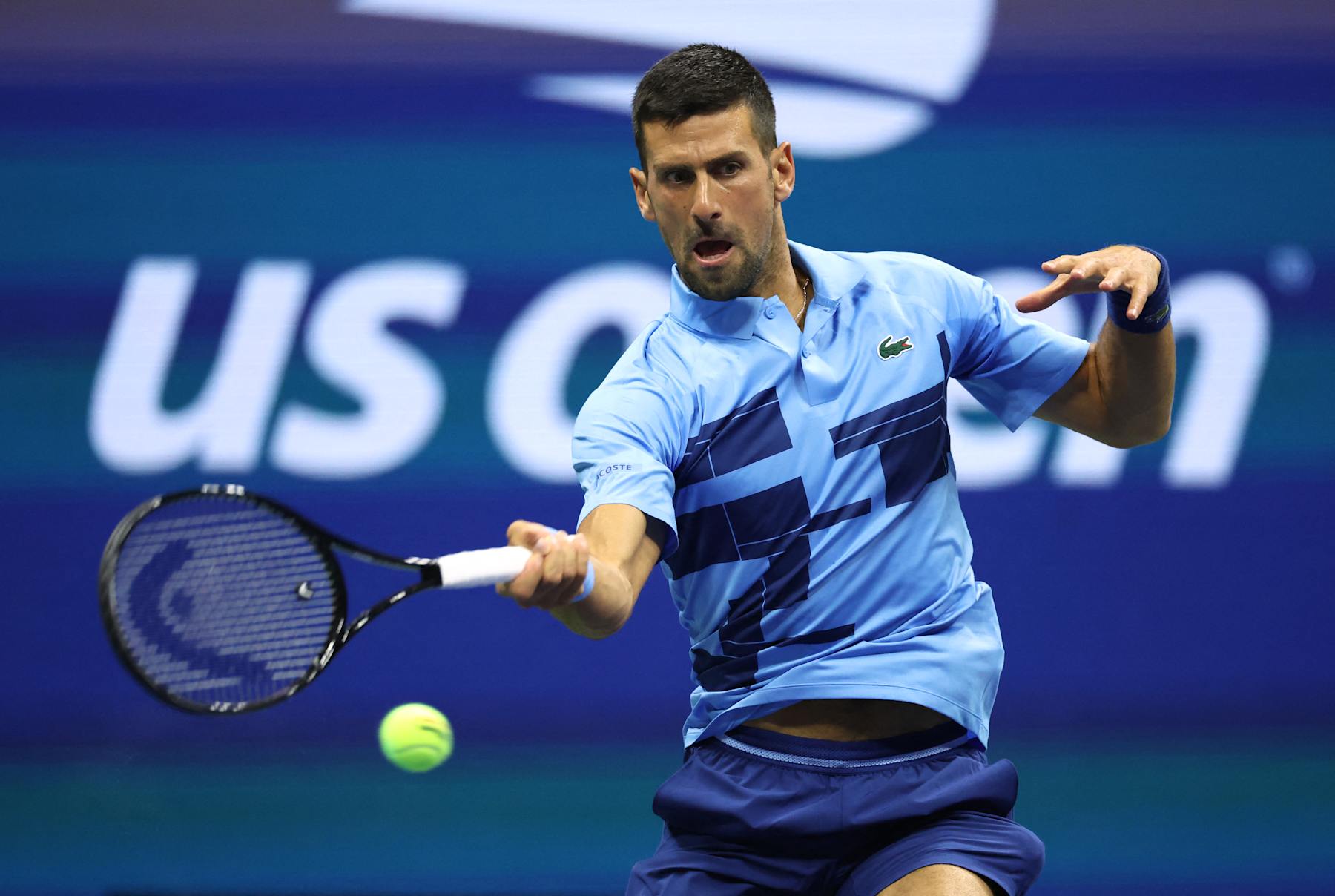 Serbia's Novak Djokovic returns the ball to Moldova's Radu Albot during their men's singles first round tennis match on day one of the US Open tennis tournament at the USTA Billie Jean King National Tennis Center in New York City, on August 26, 2024. (Photo by CHARLY TRIBALLEAU / AFP) (Photo by CHARLY TRIBALLEAU/AFP via Getty Images)