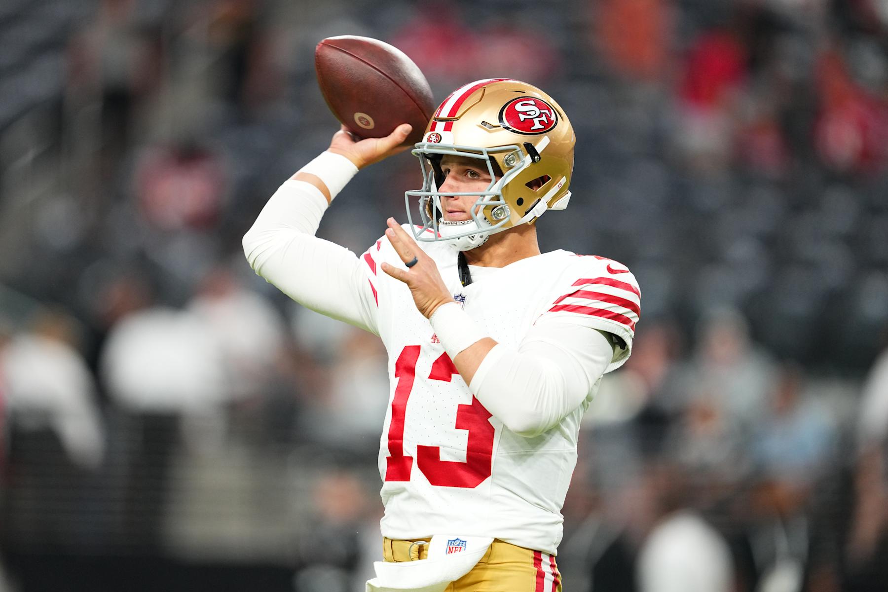 LAS VEGAS, NEVADA - AUGUST 23:  Quarterback Brock Purdy #13 of the San Francisco 49ers warms up before a preseason game against the Las Vegas Raiders at Allegiant Stadium on August 23, 2024 in Las Vegas, Nevada. (Photo by Chris Unger/Getty Images)