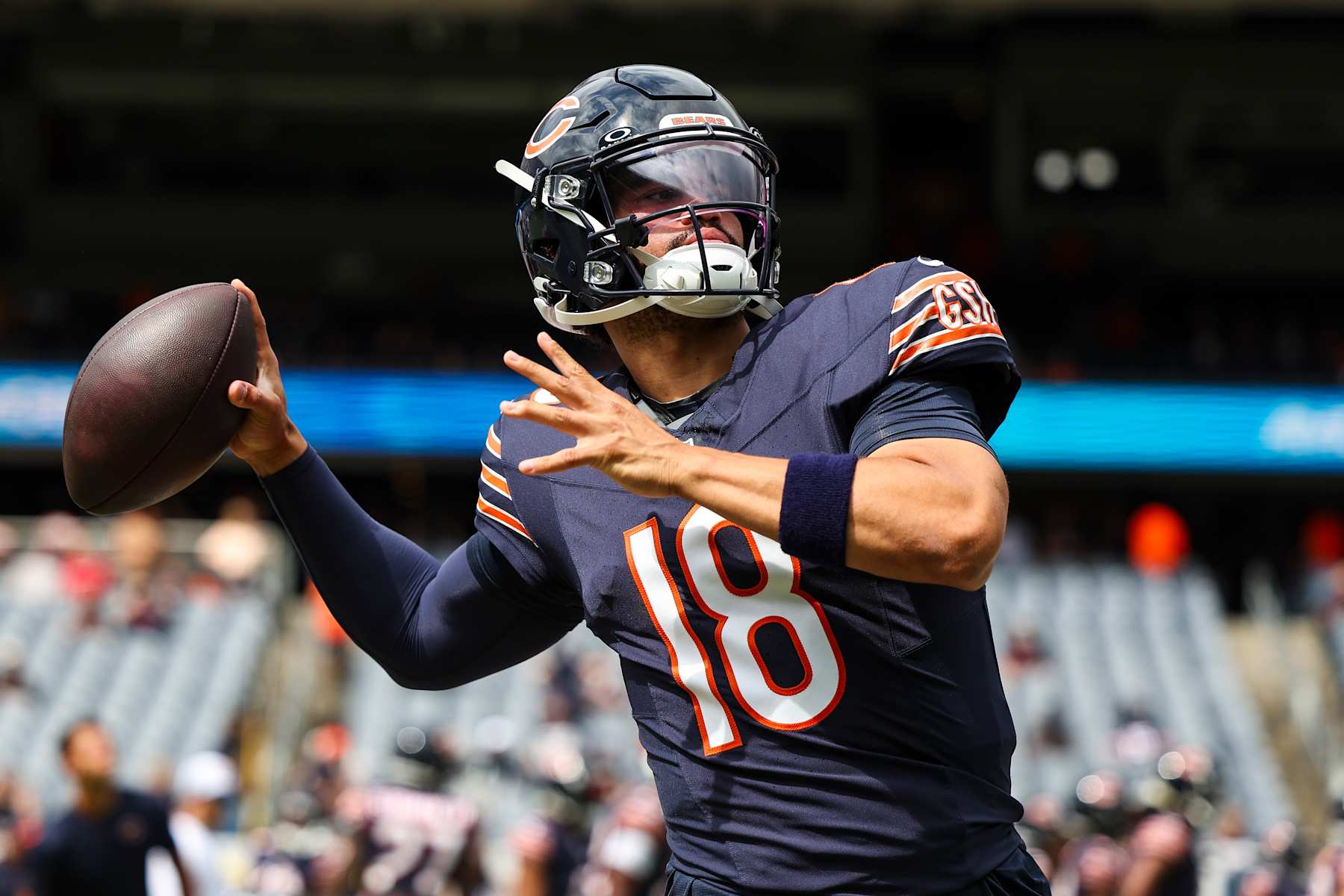 CHICAGO, IL - AUGUST 17: Caleb Williams #18 of the Chicago Bears warms up prior to an NFL football game against the Cincinnati Bengals at Solider Field on August 17, 2024 in Chicago, Illinois. (Photo by Perry Knotts/Getty Images)