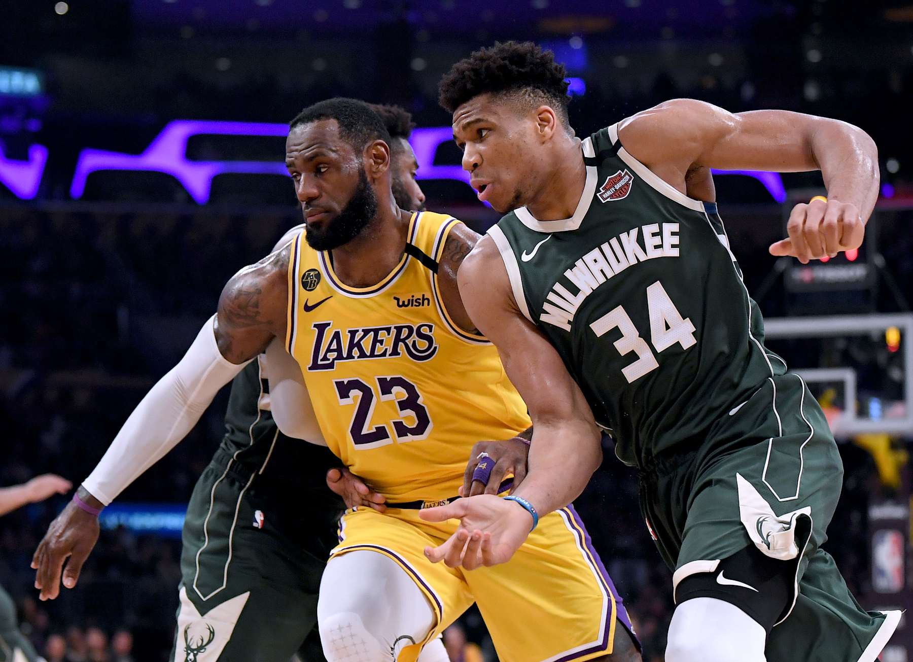 LOS ANGELES, CALIFORNIA - MARCH 06:  Giannis Antetokounmpo #34 of the Milwaukee Bucks attempts to get open as LeBron James #23 of the Los Angeles Lakers defends during the third quarter at Staples Center on March 06, 2020 in Los Angeles, California.  NOTE TO USER: User expressly acknowledges and agrees that, by downloading and or using this photograph, User is consenting to the terms and conditions of the Getty Images License Agreement.  (Photo by Harry How/Getty Images)