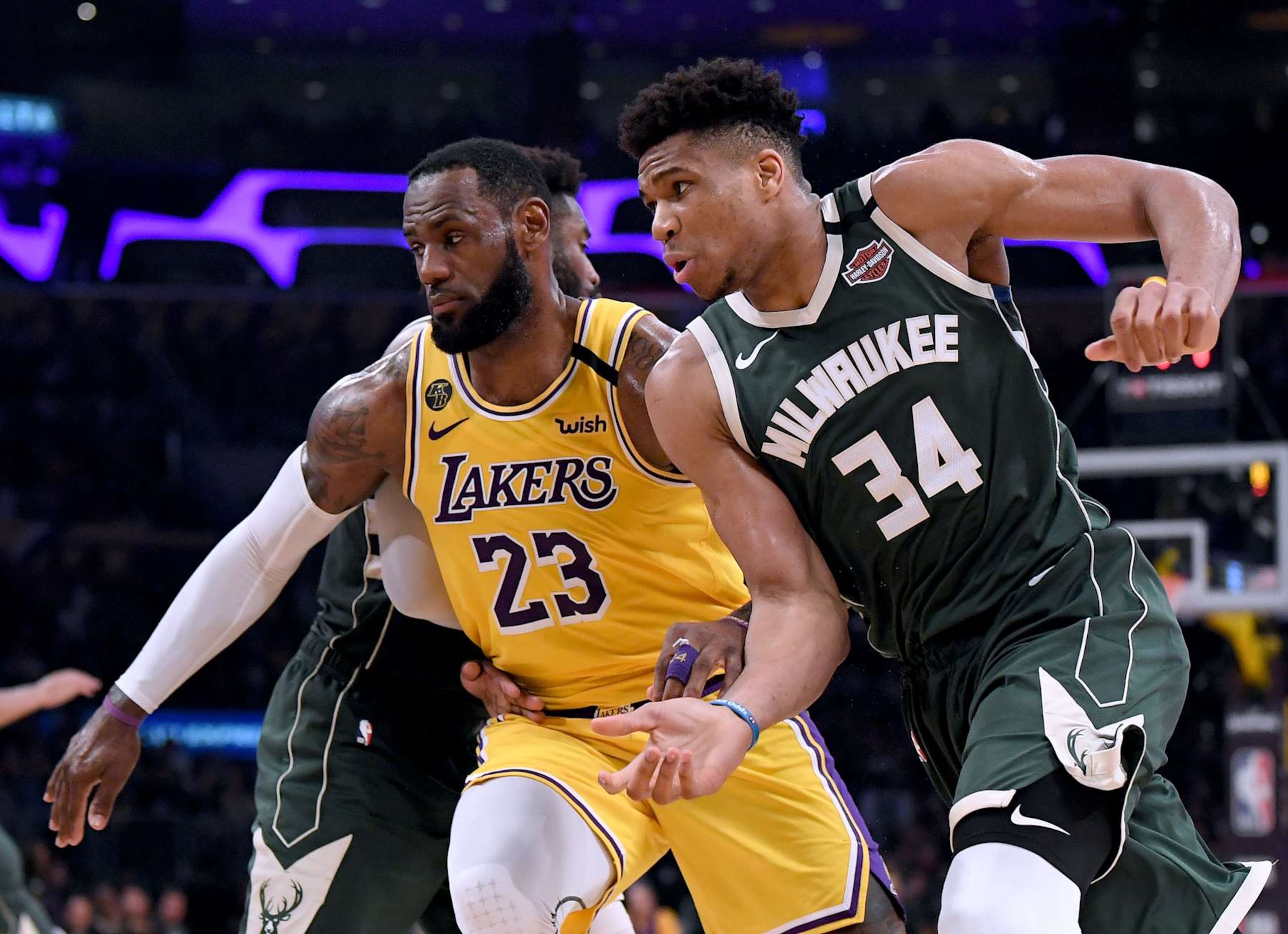 LOS ANGELES, CALIFORNIA - MARCH 06:  Giannis Antetokounmpo #34 of the Milwaukee Bucks attempts to get open as LeBron James #23 of the Los Angeles Lakers defends during the third quarter at Staples Center on March 06, 2020 in Los Angeles, California.  NOTE TO USER: User expressly acknowledges and agrees that, by downloading and or using this photograph, User is consenting to the terms and conditions of the Getty Images License Agreement.  (Photo by Harry How/Getty Images)