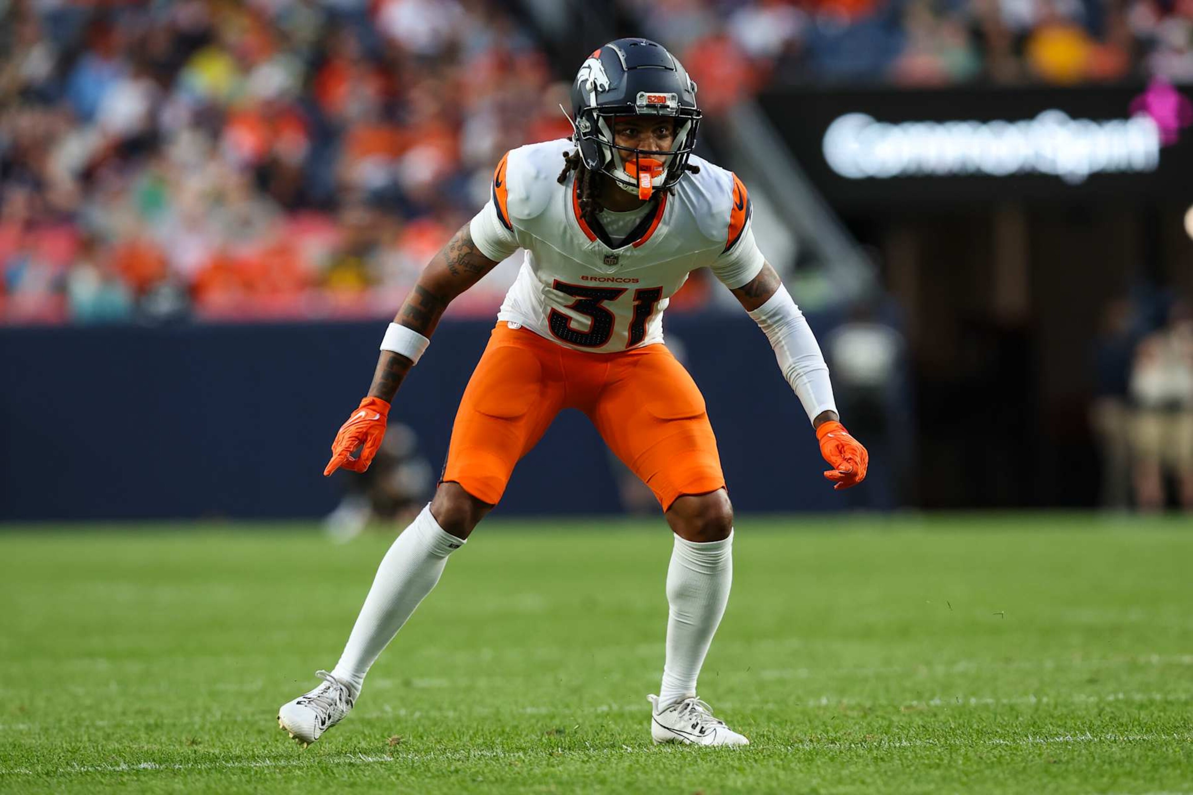 DENVER, CO - AUGUST 18: Kris Abrams-Draine #31 of the Denver Broncos defends in coverage during an NFL football game against the Green Bay Packers at Empower Field at Mile High on August 18, 2024 in Denver, CO. (Photo by Perry Knotts/Getty Images)
