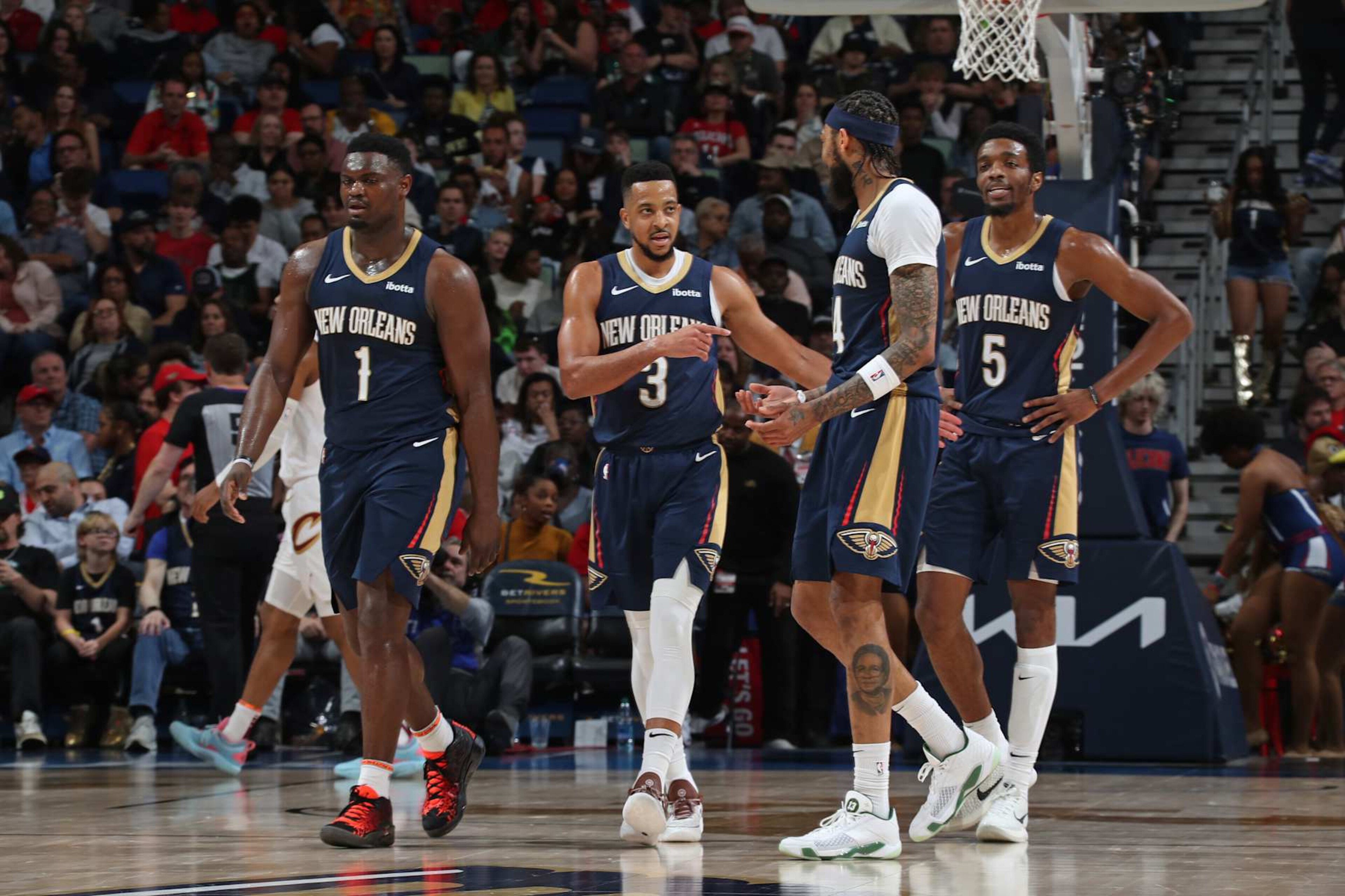 NEW ORLEANS, LA - MARCH 13: CJ McCollum #3 of the New Orleans Pelicans talks to Brandon Ingram #14 during the game against the Cleveland Cavaliers on March 13, 2024 at the Smoothie King Center in New Orleans, Louisiana. NOTE TO USER: User expressly acknowledges and agrees that, by downloading and or using this Photograph, user is consenting to the terms and conditions of the Getty Images License Agreement. Mandatory Copyright Notice: Copyright 2024 NBAE (Photo by Layne Murdoch Jr./NBAE via Getty Images)