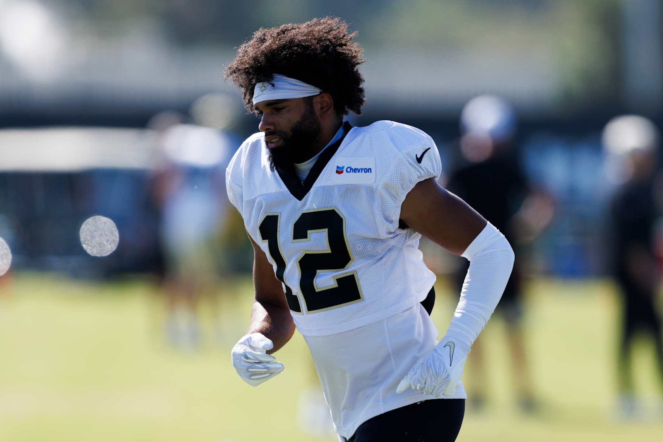 IRVINE, CALIFORNIA - JULY 29: Chris Olave #12 of the New Orleans Saints runs during training camp at University of California Irvine on July 29, 2024 in Irvine, California.  (Photo by Ric Tapia/Getty Images)