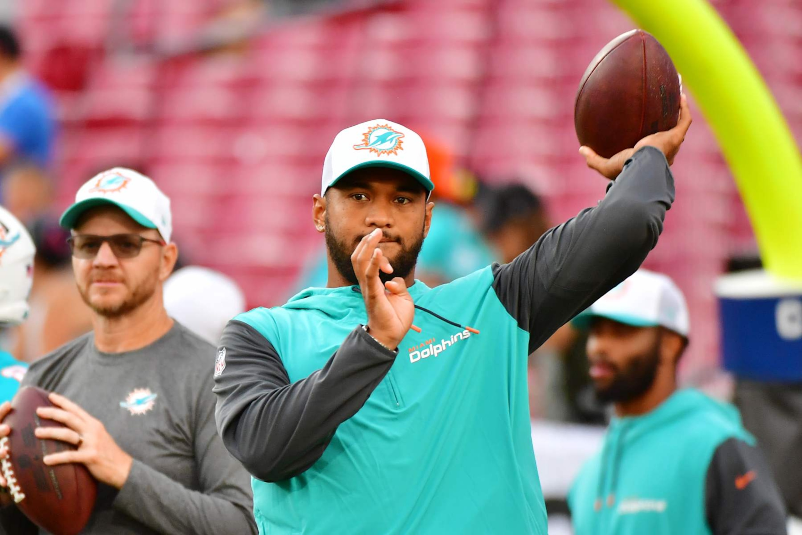 TAMPA, FLORIDA - AUGUST 23: Tua Tagovailoa #1 of the Miami Dolphins throws a pass prior to a preseason NFL game against the Tampa Bay Buccaneers at Raymond James Stadium on August 23, 2024 in Tampa, Florida. (Photo by Julio Aguilar/Getty Images)