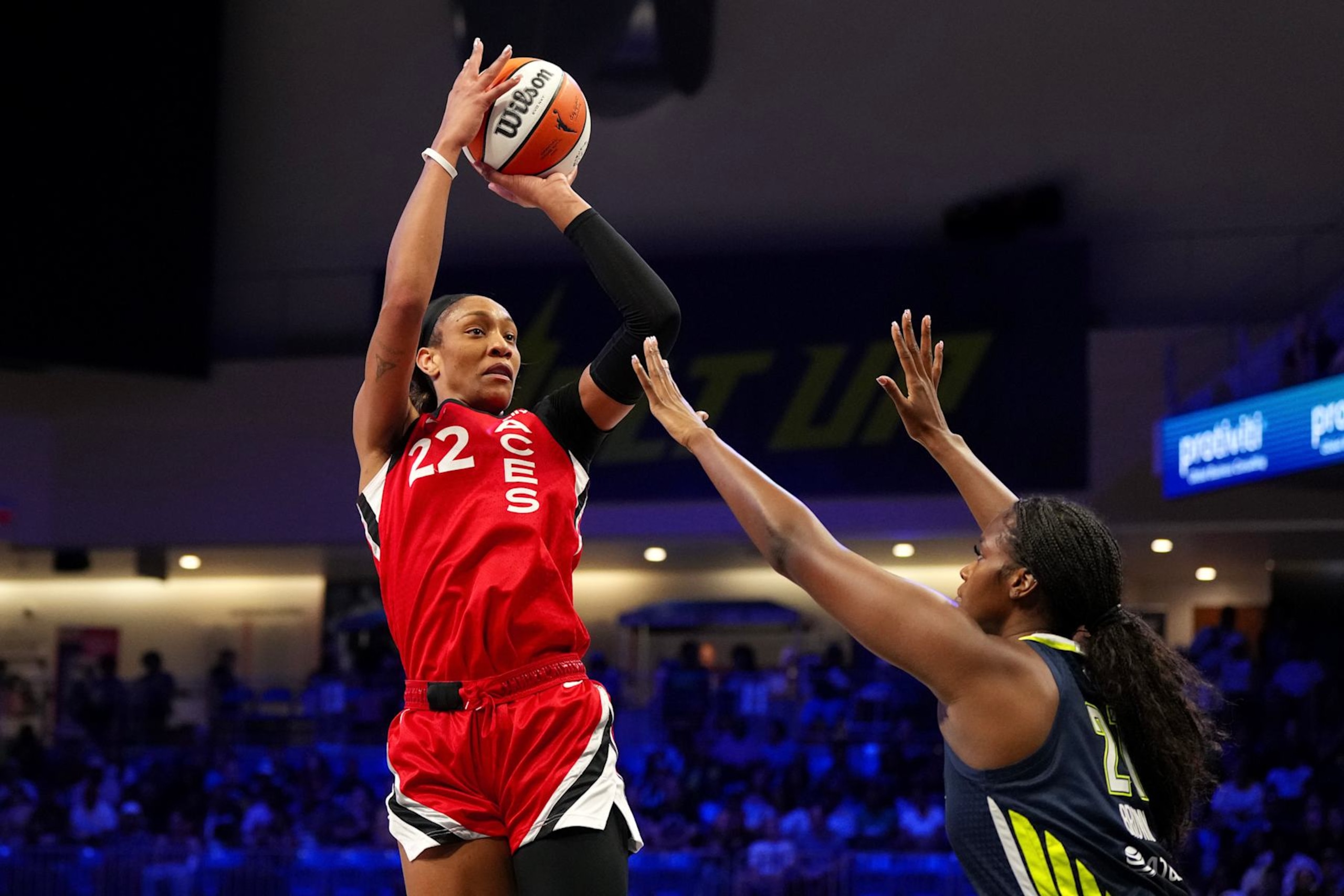 ARLINGTON, TEXAS - AUGUST 27: A'ja Wilson #22 of the Las Vegas Aces shoots over Kalani Brown #21 of the Dallas Wings during the first half at College Park Center on August 27, 2024 in Arlington, Texas. NOTE TO USER: User expressly acknowledges and agrees that, by downloading and or using this photograph, User is consenting to the terms and conditions of the Getty Images License Agreement. (Photo by Sam Hodde/Getty Images)