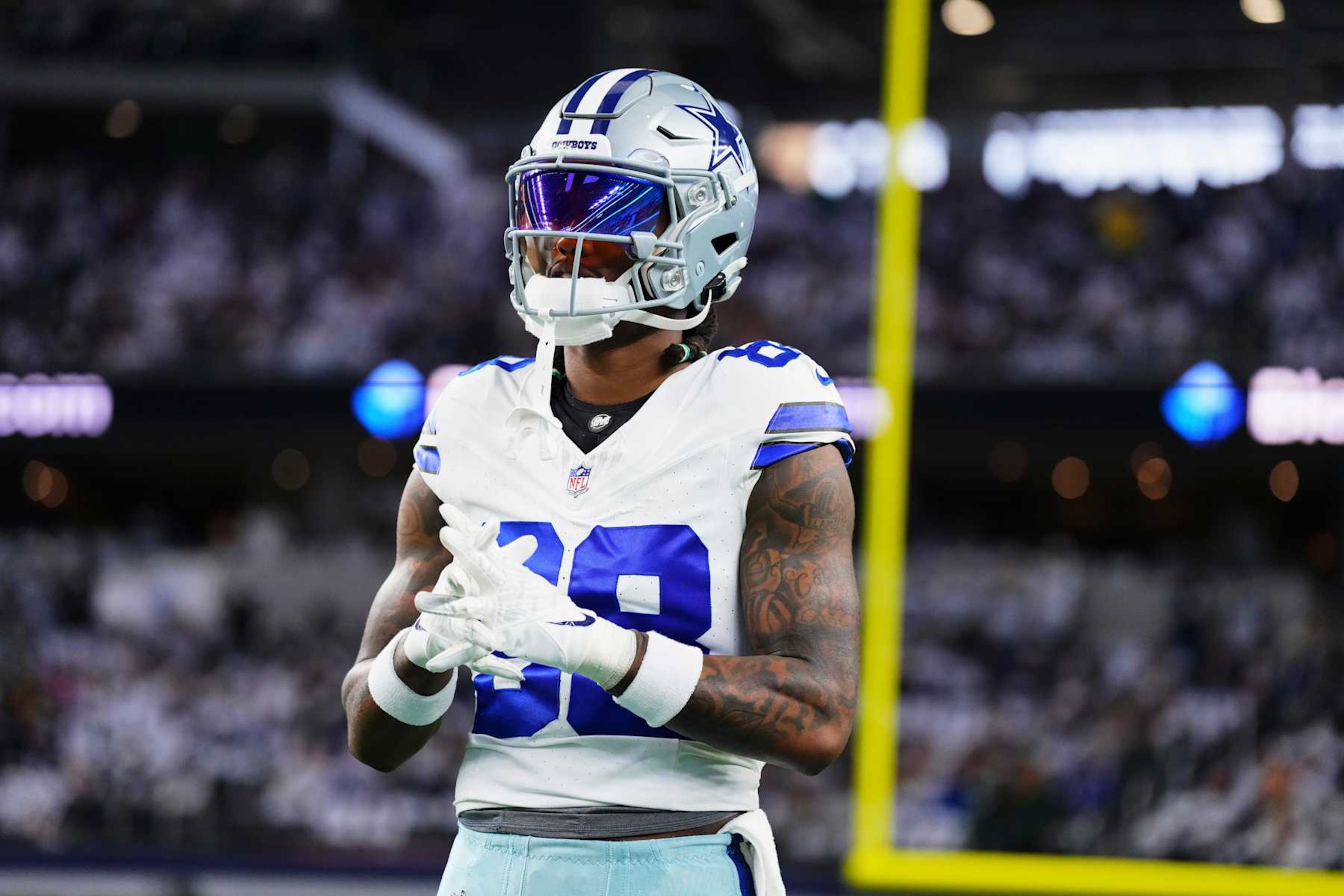 DALLAS, TX - JANUARY 14: CeeDee Lamb #88 of the Dallas Cowboys warms up before kickoff against the Green Bay Packers during the NFC Wild Card playoff game at AT&T Stadium on January 14, 2024 in Dallas, Texas. (Photo by Cooper Neill/Getty Images) DALLAS, TX - JANUARY 14: CeeDee Lamb #88 of the Dallas Cowboys warms up before kickoff against the Green Bay Packers during the NFC Wild Card playoff game at AT&T Stadium on January 14, 2024 in Dallas, Texas. (Photo by Cooper Neill/Getty Images)