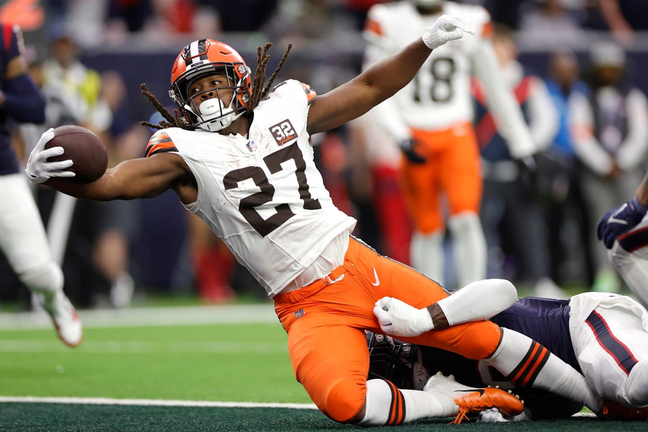 HOUSTON, TEXAS - JANUARY 13: Kareem Hunt #27 of the Cleveland Browns scores an 11 yard touchdown against the Houston Texans during the second quarter in the AFC Wild Card Playoffs at NRG Stadium on January 13, 2024 in Houston, Texas. (Photo by Carmen Mandato/Getty Images) HOUSTON, TEXAS - JANUARY 13: Kareem Hunt #27 of the Cleveland Browns scores an 11 yard touchdown against the Houston Texans during the second quarter in the AFC Wild Card Playoffs at NRG Stadium on January 13, 2024 in Houston, Texas. (Photo by Carmen Mandato/Getty Images)