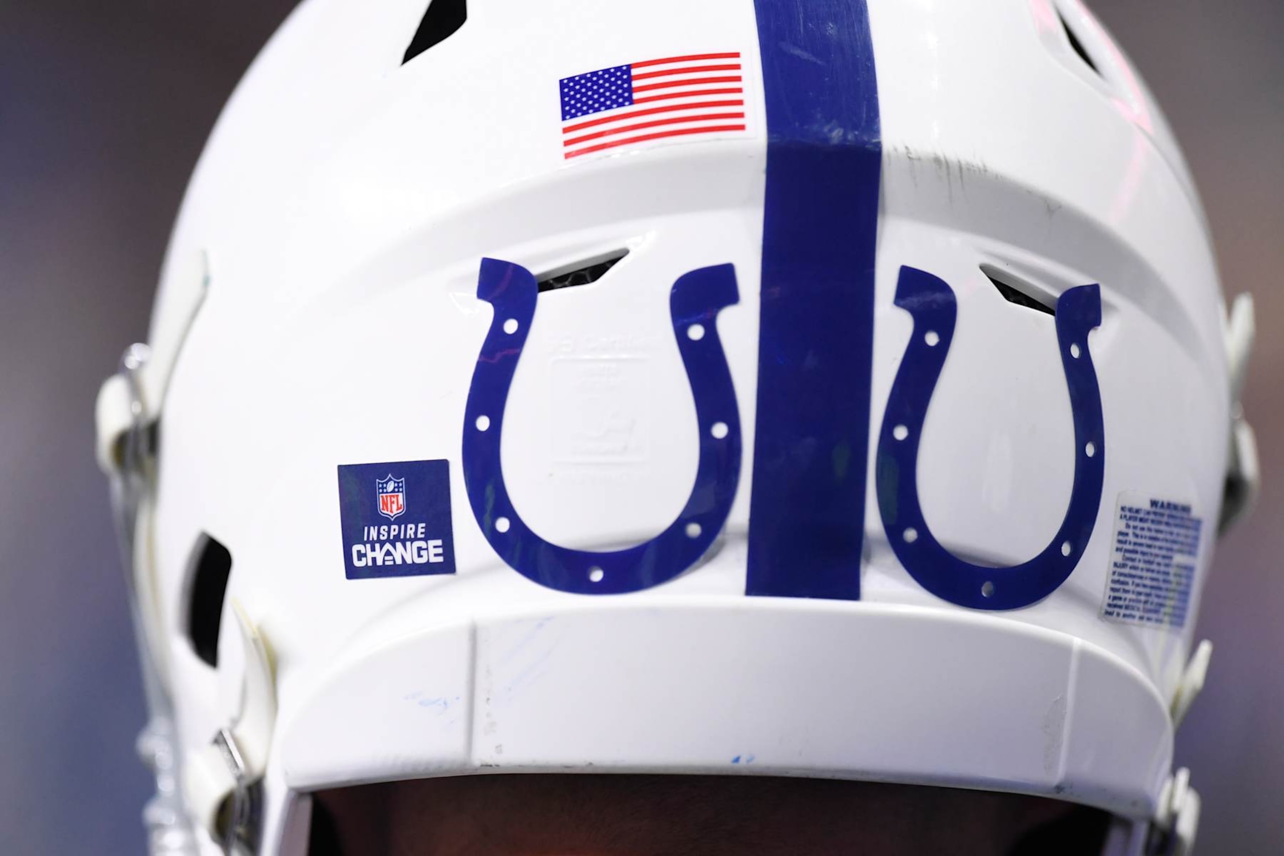 INDIANAPOLIS, IN - DECEMBER 16: An Inspire Change decal is seen beside Indianapolis Colts logos on the back of the helmet of a player during the NFL game between the Pittsburgh Steelers and the Indianapolis Colts on December 16, 2023, at Lucas Oil Stadium in Indianapolis, Indiana. (Photo by Michael Allio/Icon Sportswire via Getty Images) INDIANAPOLIS, IN - DECEMBER 16: An Inspire Change decal is seen beside Indianapolis Colts logos on the back of the helmet of a player during the NFL game between the Pittsburgh Steelers and the Indianapolis Colts on December 16, 2023, at Lucas Oil Stadium in Indianapolis, Indiana. (Photo by Michael Allio/Icon Sportswire via Getty Images)