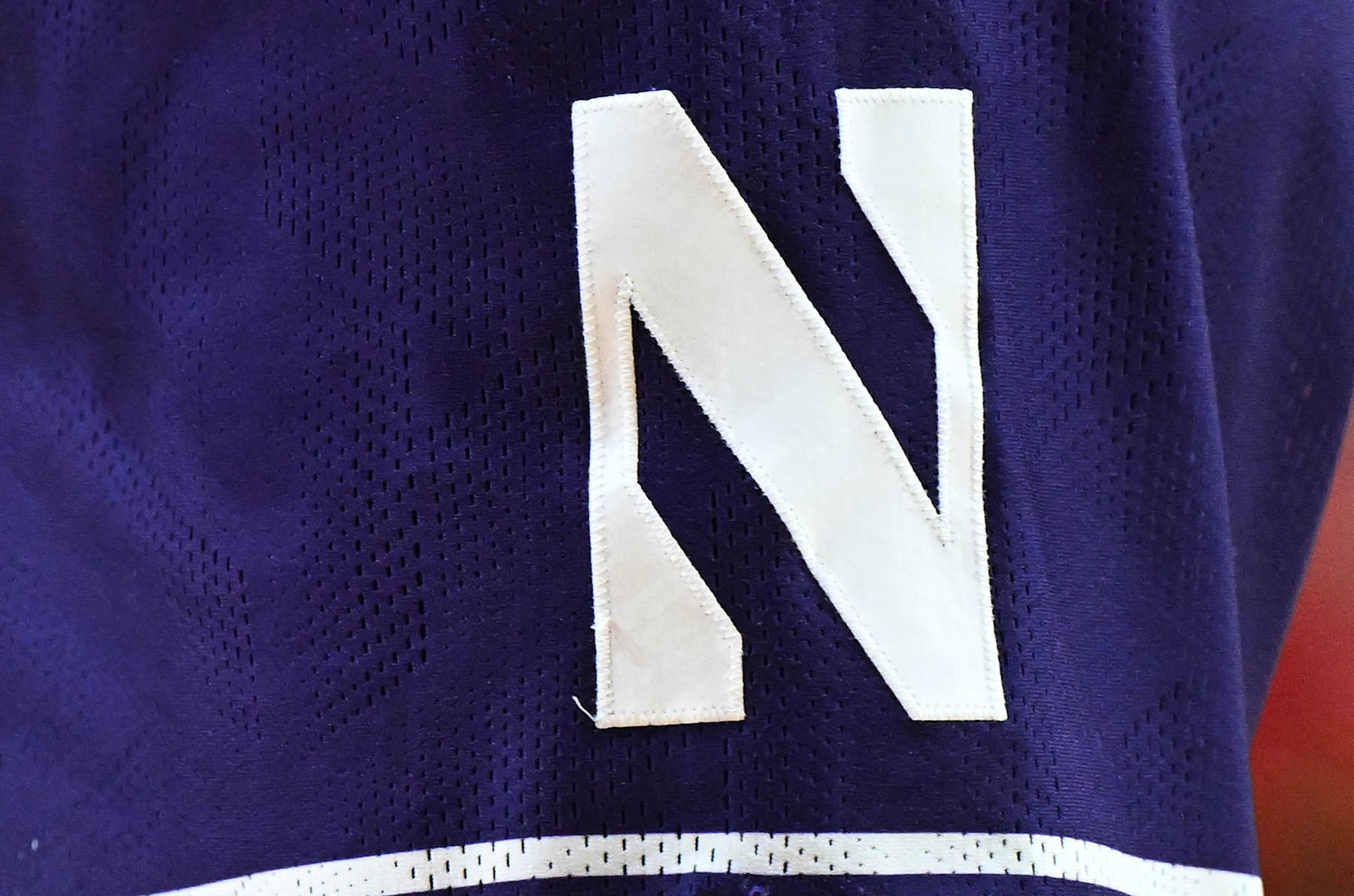 COLLEGE PARK, MARYLAND - FEBRUARY 28: A view of the Northwestern Wildcats logo on their uniform during the game against the Maryland Terrapins at Xfinity Center on February 28, 2024 in College Park, Maryland. (Photo by G Fiume/Getty Images)