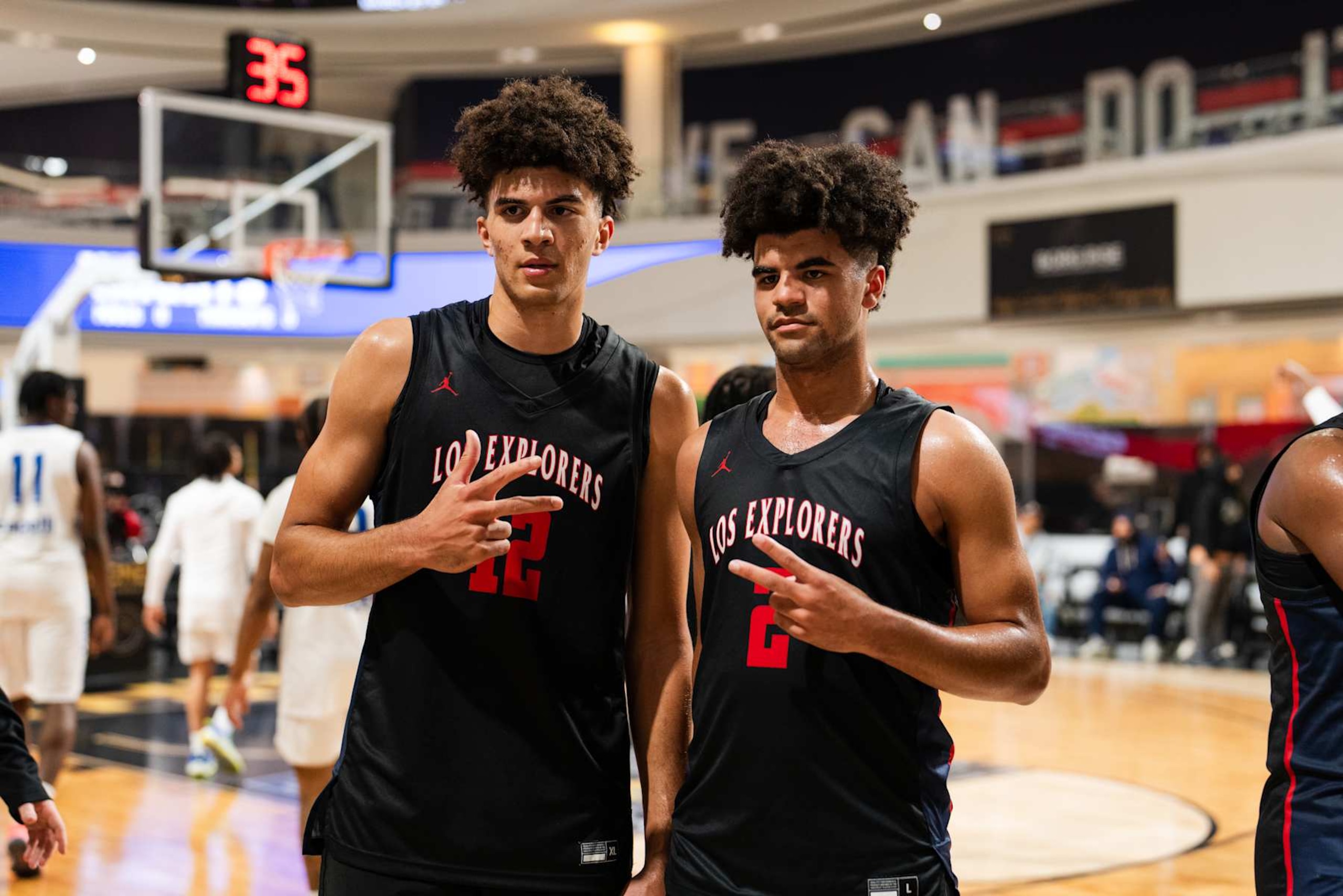EAST RUTHERFORD, NJ - MARCH 27: Cayden Boozer #2 and Cameron Boozer #12 of the Columbus Explorers pose for picture after the game against the Notre Dame Knights during The Throne high school basketball tournament on March 27, 2024 at American Dream in East Rutherford, New Jersey. NOTE TO USER: User expressly acknowledges and agrees that, by downloading and/or using this photograph, user is consenting to the terms and conditions of the Getty Images License Agreement. Mandatory Copyright Notice: Copyright 2024 NBAE (Photo by Evan Yu/NBAE via Getty Images)