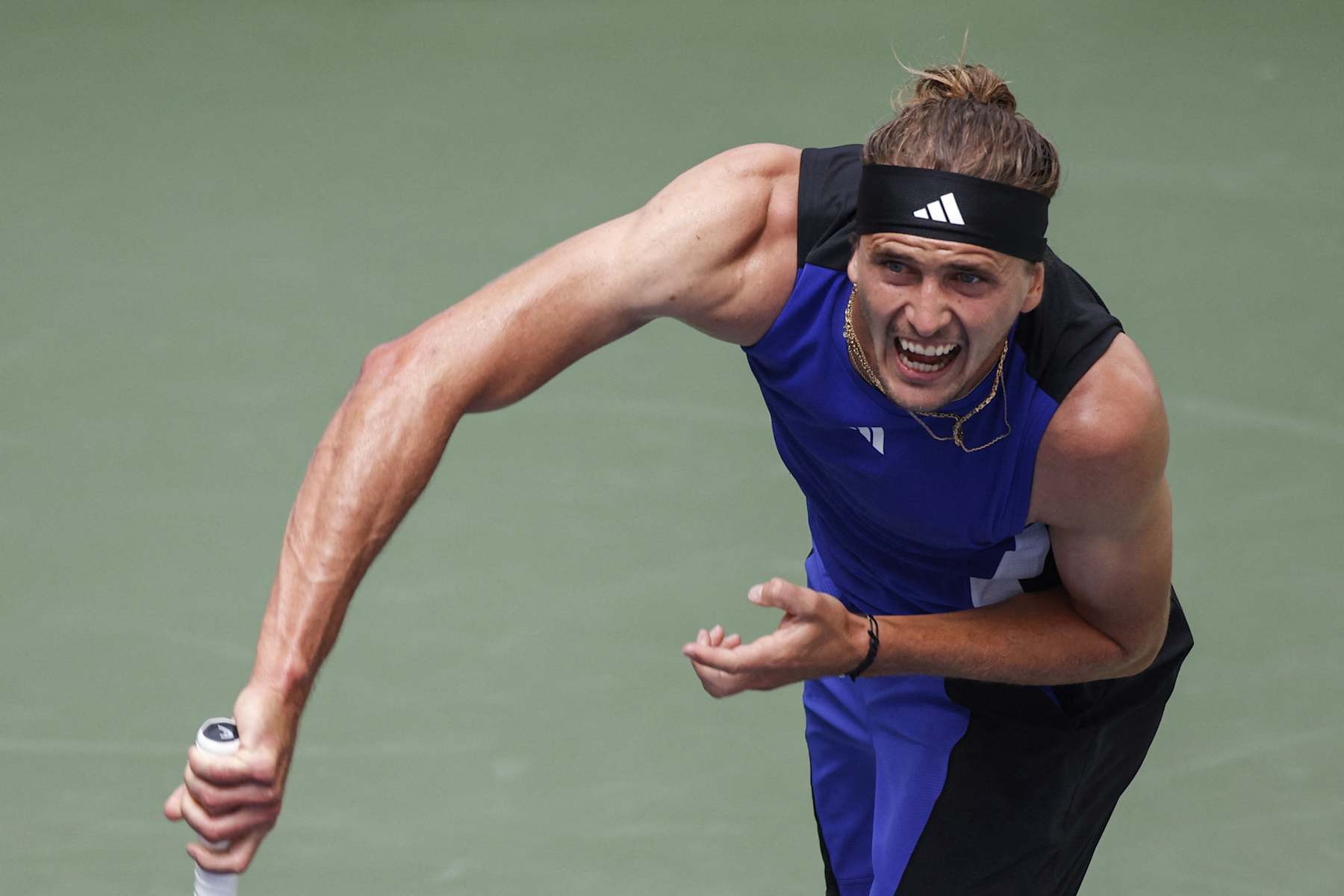 Germany's Alexander Zverev serves to France's Alexandre Muller during their men's singles second round tennis match on day three of the US Open tennis tournament at the USTA Billie Jean King National Tennis Center in New York City, on August 28, 2024. (Photo by Kena BETANCUR / AFP) (Photo by KENA BETANCUR/AFP via Getty Images)