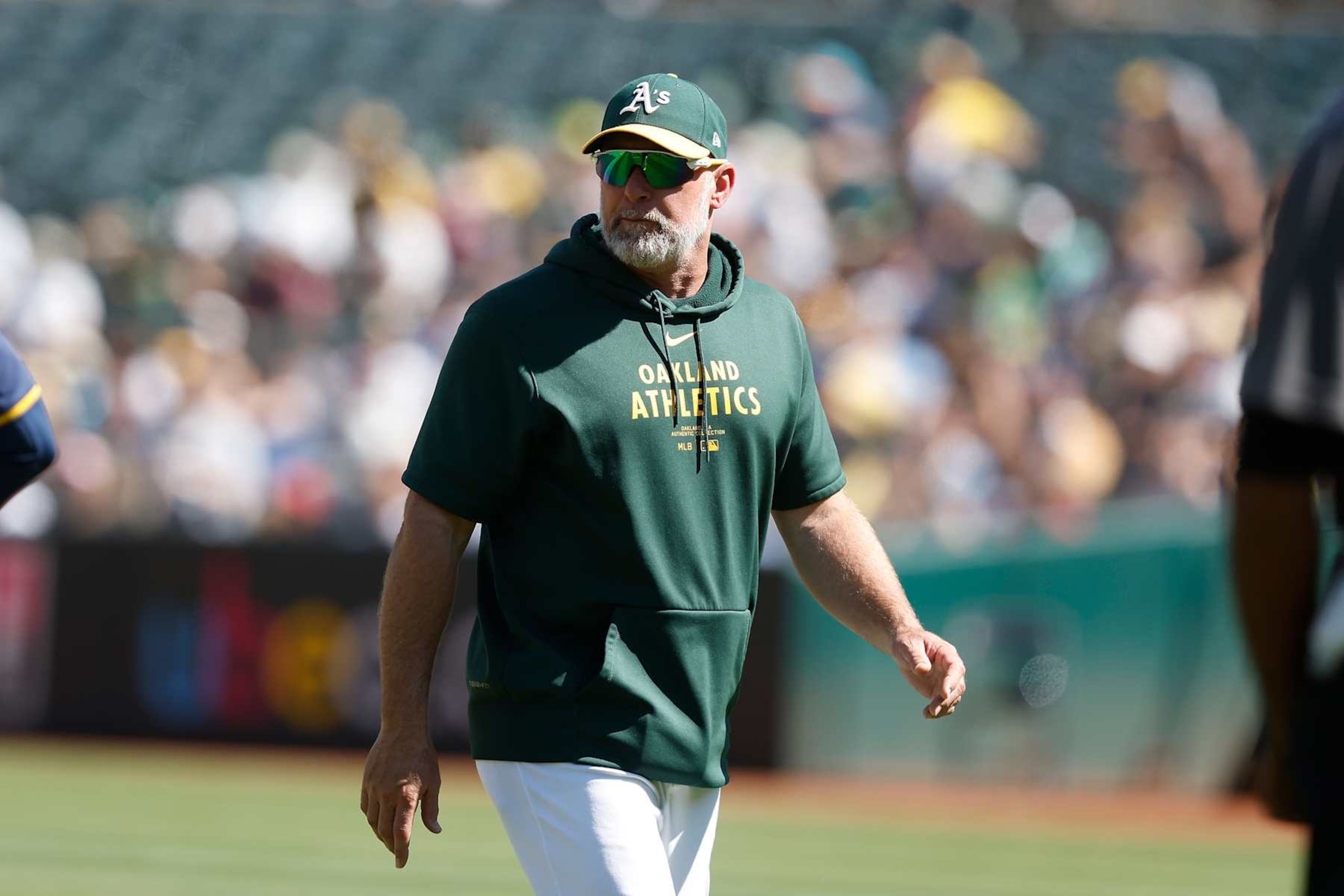 OAKLAND, CALIFORNIA - AUGUST 25: Manager Mark Kotsay #7 of the Oakland Athletics looks on during the game against the Milwaukee Brewers at Oakland Coliseum on August 25, 2024 in Oakland, California. (Photo by Lachlan Cunningham/Getty Images)
