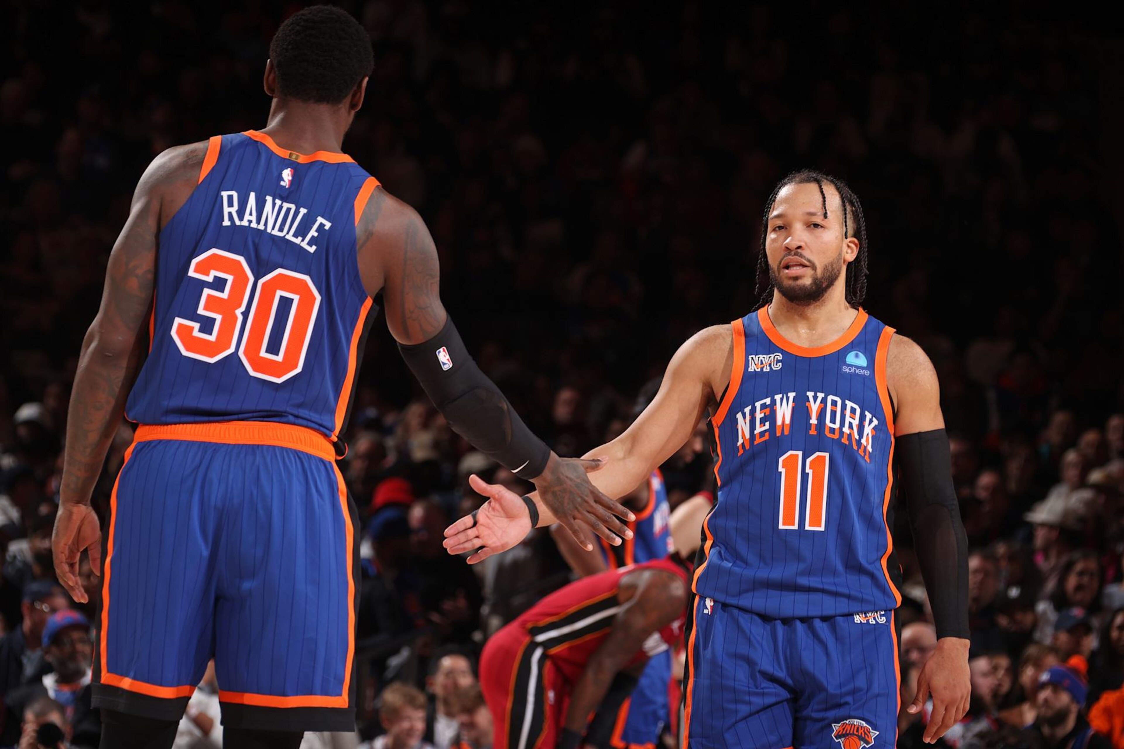 NEW YORK, NY - JANUARY 27: Jalen Brunson #11 and Julius Randle #30 of the New York Knicks high five during the game against the Miami Heat on January 27, 2024 at Madison Square Garden in New York City, New York. NOTE TO USER: User expressly acknowledges and agrees that, by downloading and or using this photograph, User is consenting to the terms and conditions of the Getty Images License Agreement. Mandatory Copyright Notice: Copyright 2024 NBAE (Photo by Nathaniel S. Butler/NBAE via Getty Images) NEW YORK, NY - JANUARY 27: Jalen Brunson #11 and Julius Randle #30 of the New York Knicks high five during the game against the Miami Heat on January 27, 2024 at Madison Square Garden in New York City, New York. NOTE TO USER: User expressly acknowledges and agrees that, by downloading and or using this photograph, User is consenting to the terms and conditions of the Getty Images License Agreement. Mandatory Copyright Notice: Copyright 2024 NBAE (Photo by Nathaniel S. Butler/NBAE via Getty Images)