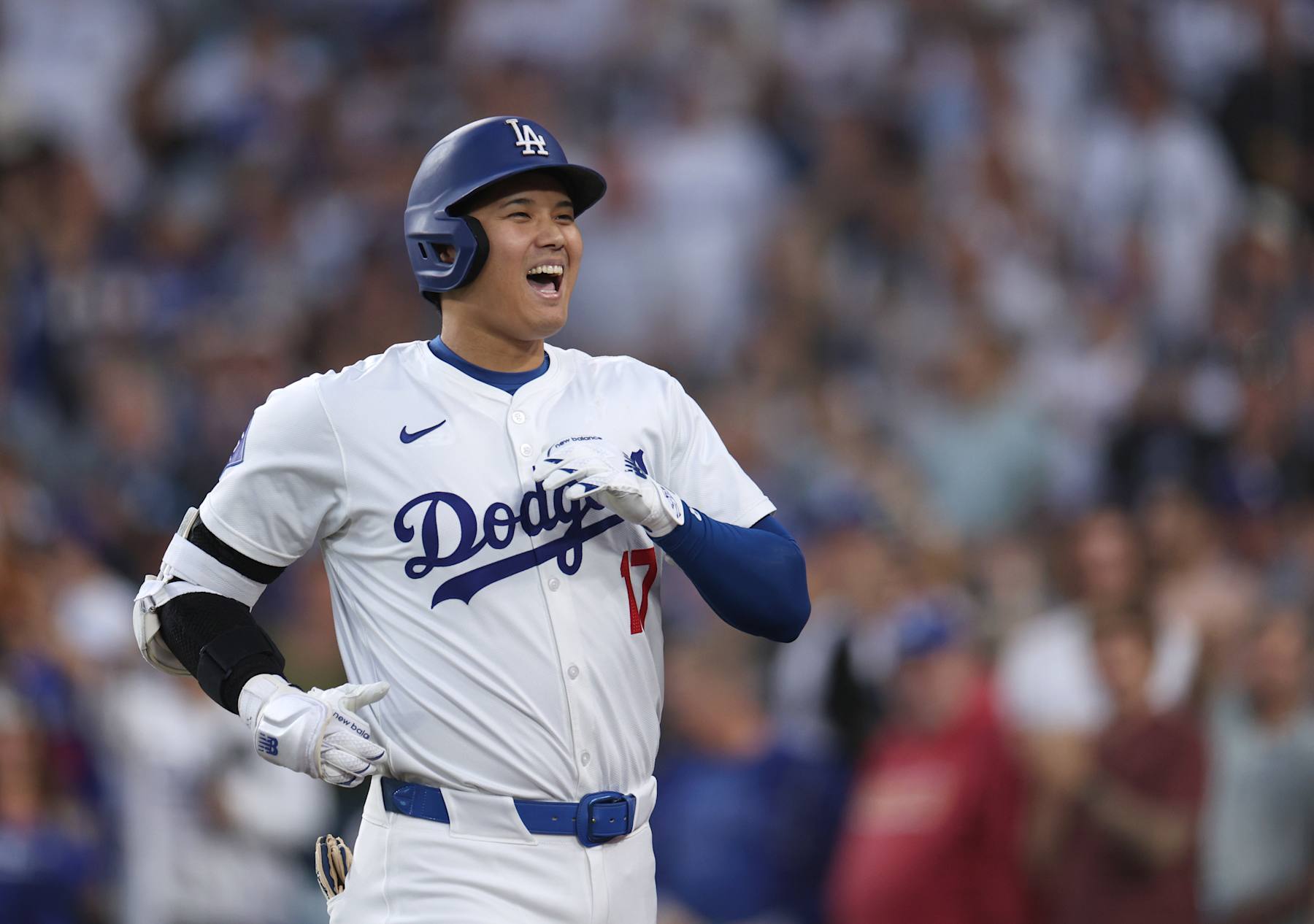 LOS ANGELES, CALIFORNIA - AUGUST 28: Shohei Ohtani #17 of the Los Angeles Dodgers reacts to his solo home run, his 42nd of the season, to take a 1-0 lead over the Baltimore Orioles, during the first inning at Dodger Stadium on August 28, 2024 in Los Angeles, California. (Photo by Harry How/Getty Images)