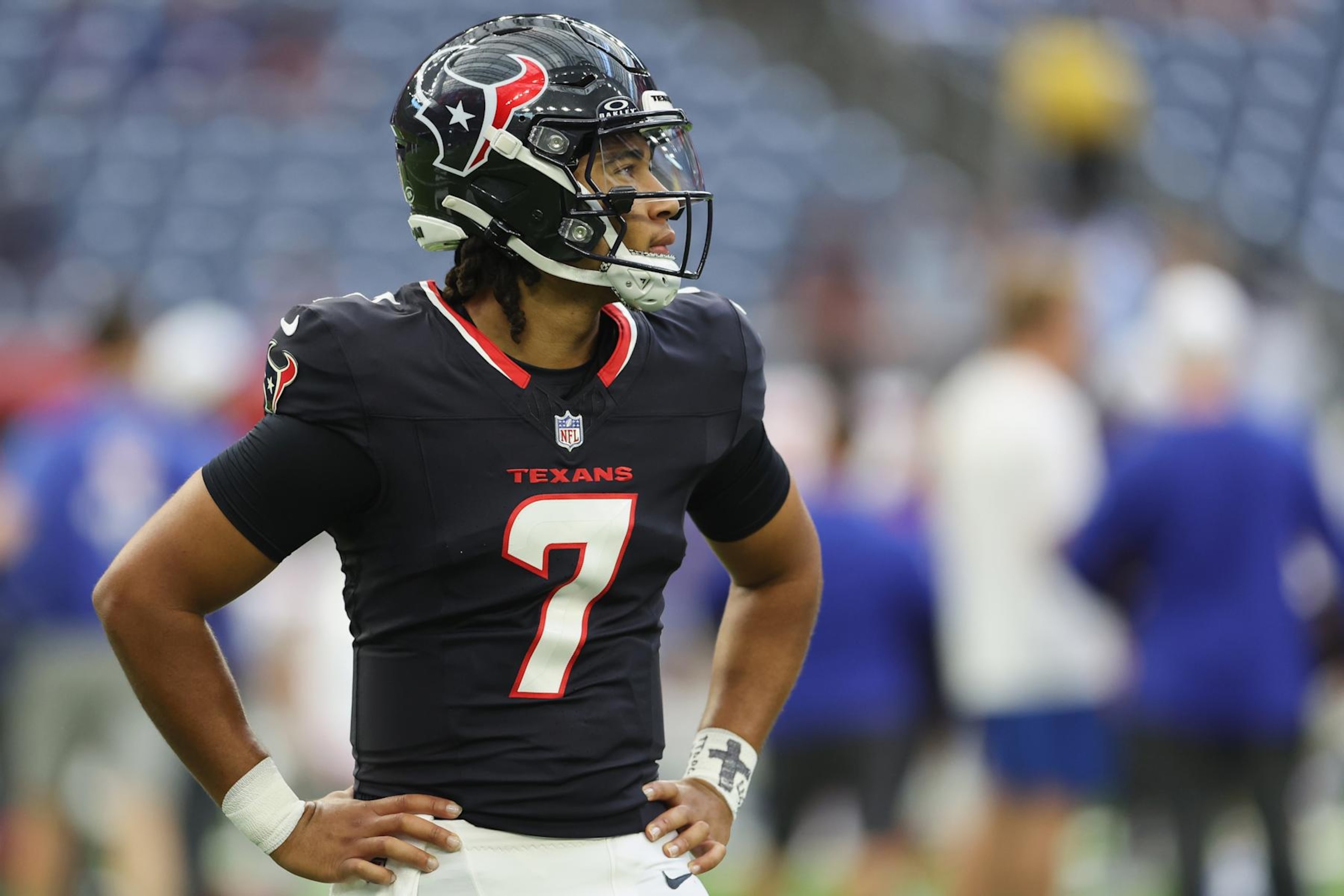 HOUSTON, TEXAS - AUGUST 17: C.J. Stroud #7 of the Houston Texans stands on the field before the preseason game against the New York Giants at NRG Stadium on August 17, 2024 in Houston, Texas. (Photo by Tim Warner/Getty Images)