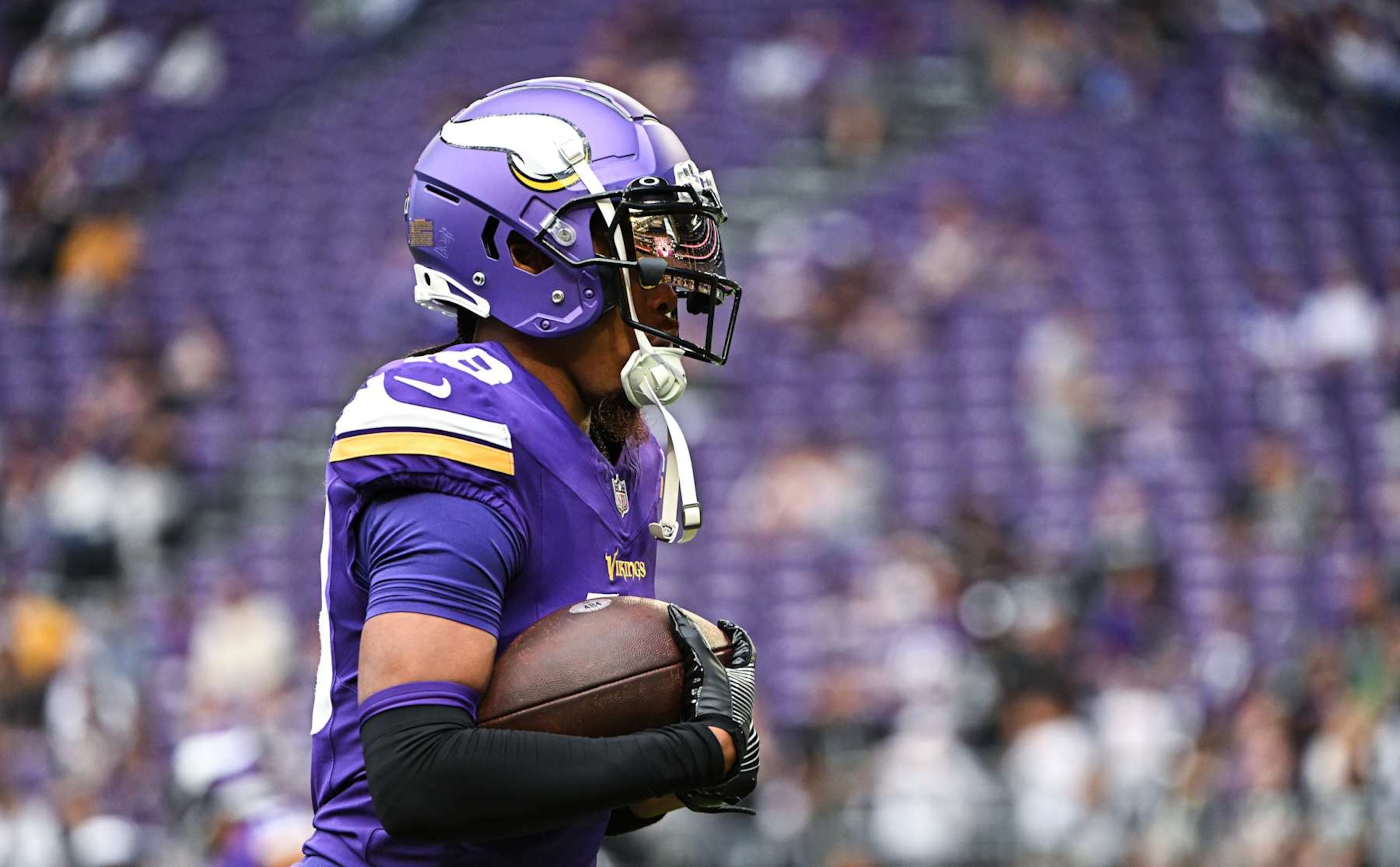MINNEAPOLIS, MINNESOTA - AUGUST 10: Justin Jefferson #18 of the Minnesota Vikings warms up before the preseason game against the Las Vegas Raiders at U.S. Bank Stadium on August 10, 2024 in Minneapolis, Minnesota. (Photo by Stephen Maturen/Getty Images)