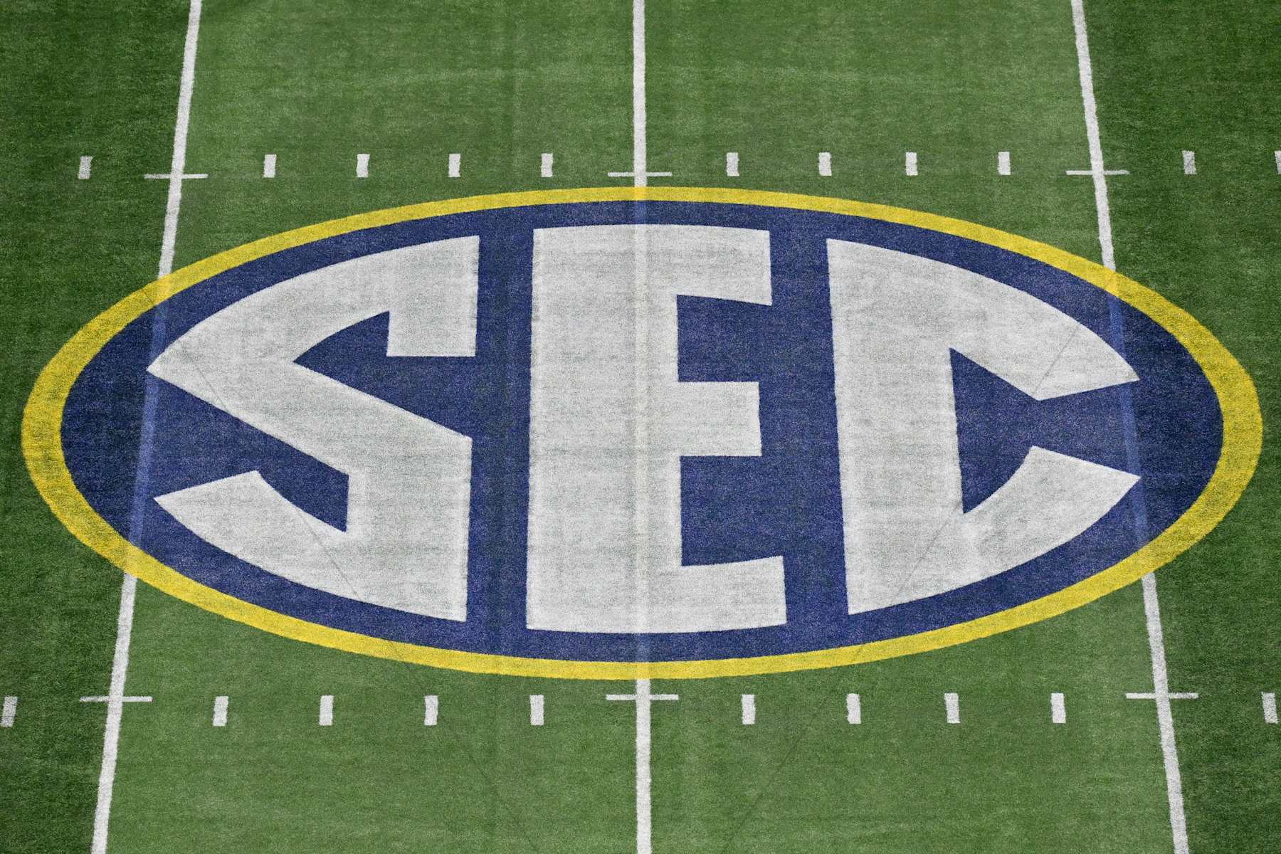 ATLANTA, GEORGIA - DECEMBER 02: A view of the SEC logo at midfield before the SEC Championship football game between the Georgia Bulldogs and the Alabama Crimson Tide at Mercedes-Benz Stadium on December 02, 2023 in Atlanta, Georgia. (Photo by Alika Jenner/Getty Images)