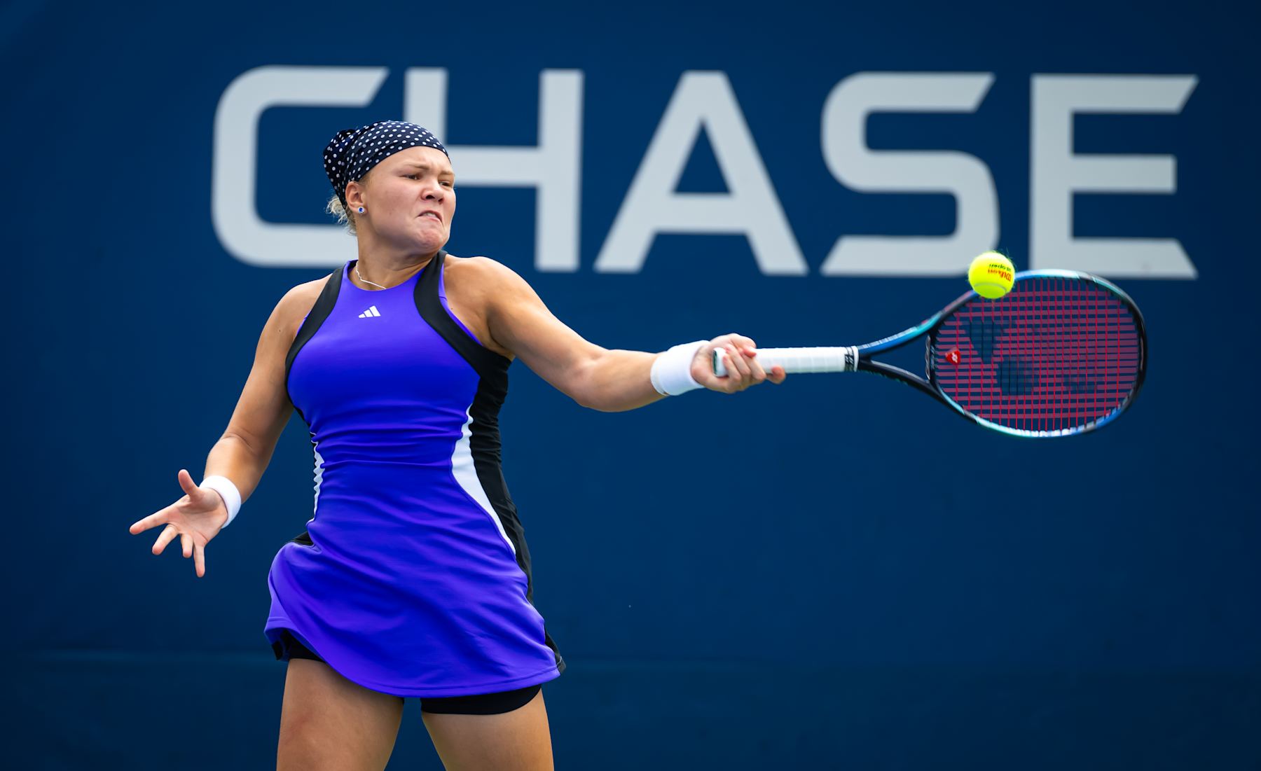 NEW YORK, NEW YORK - AUGUST 29: Diana Shnaider in action against Clara Tauson of Denmark in the second round on Day 4 of the US Open at USTA Billie Jean King National Tennis Center on August 29, 2024 in New York City (Photo by Robert Prange/Getty Images)