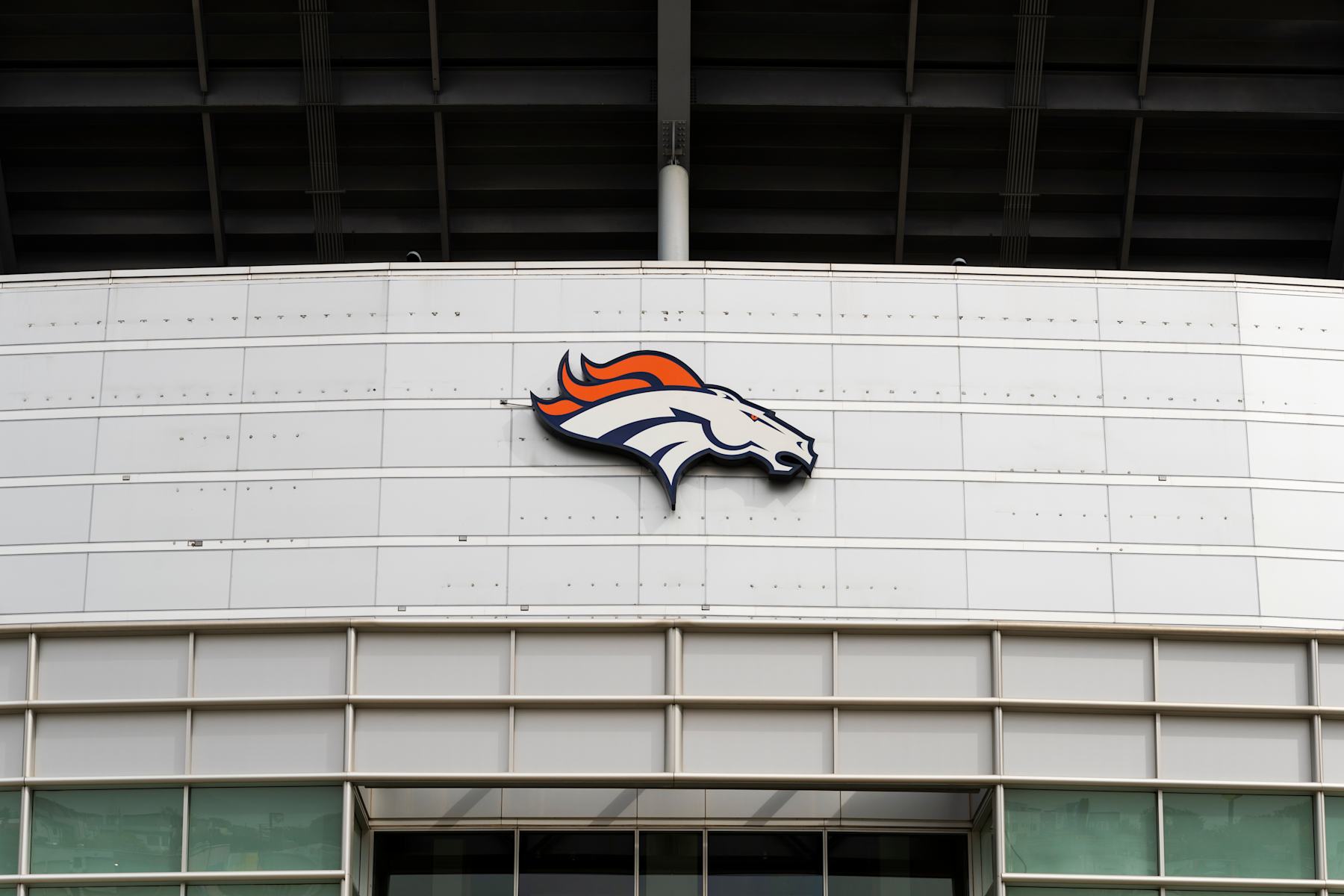 DENVER, CO - OCTOBER 01: General view of the Denver Broncos logo on the side of Broncos Stadium at Mile High before the NFL regular season football game against the Kansas City Chiefs and the Denver Broncos on October 01, 2018, at Broncos Stadium at Mile High in Denver, CO.  (Photo by Ric Tapia/Icon Sportswire via Getty Images)