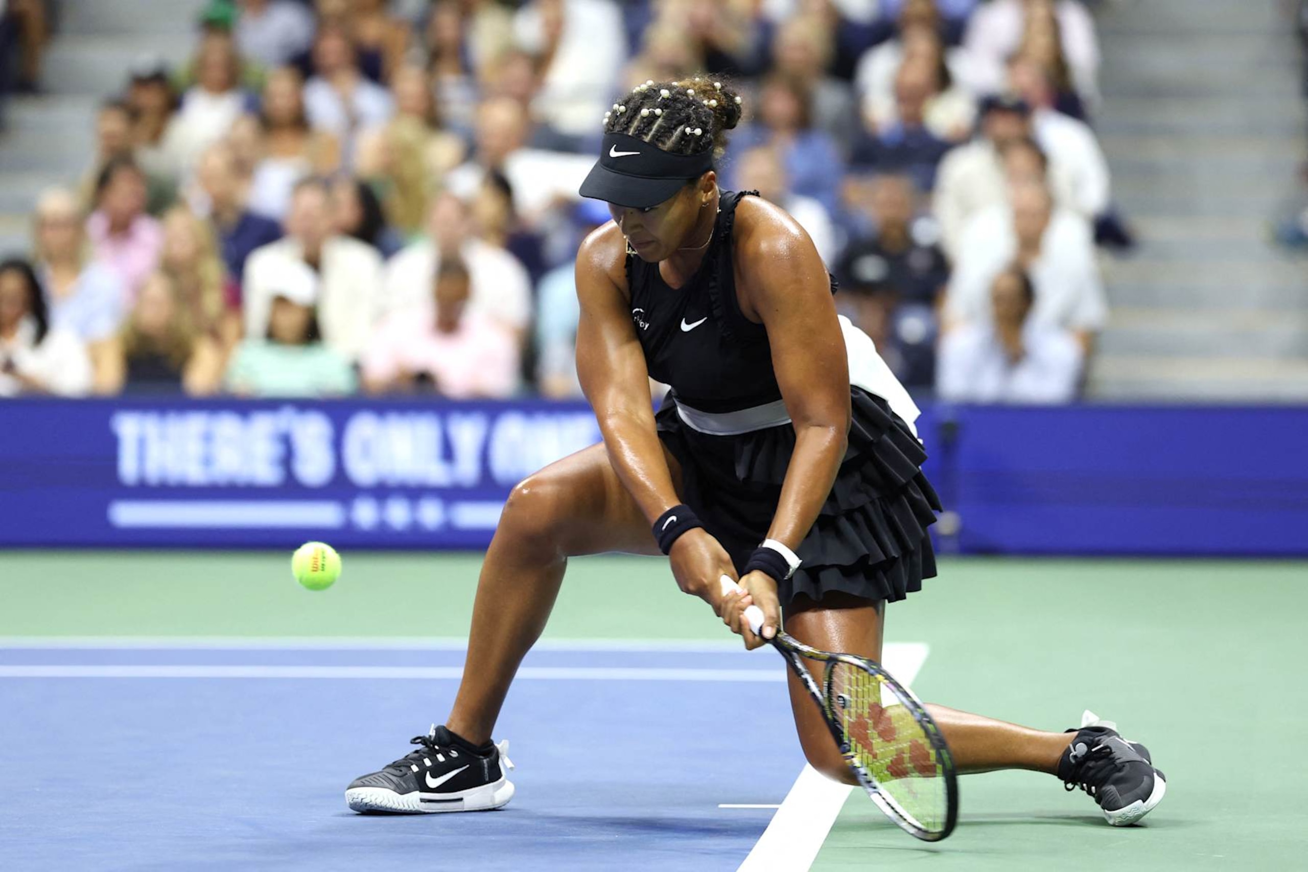 Japan's Naomi Osaka returns the ball to Czech Republic's Karolina Muchova during their women's singles second round tennis match on day four of the US Open tennis tournament at the USTA Billie Jean King National Tennis Center in New York City, on August 29, 2024. (Photo by CHARLY TRIBALLEAU / AFP) (Photo by CHARLY TRIBALLEAU/AFP via Getty Images)