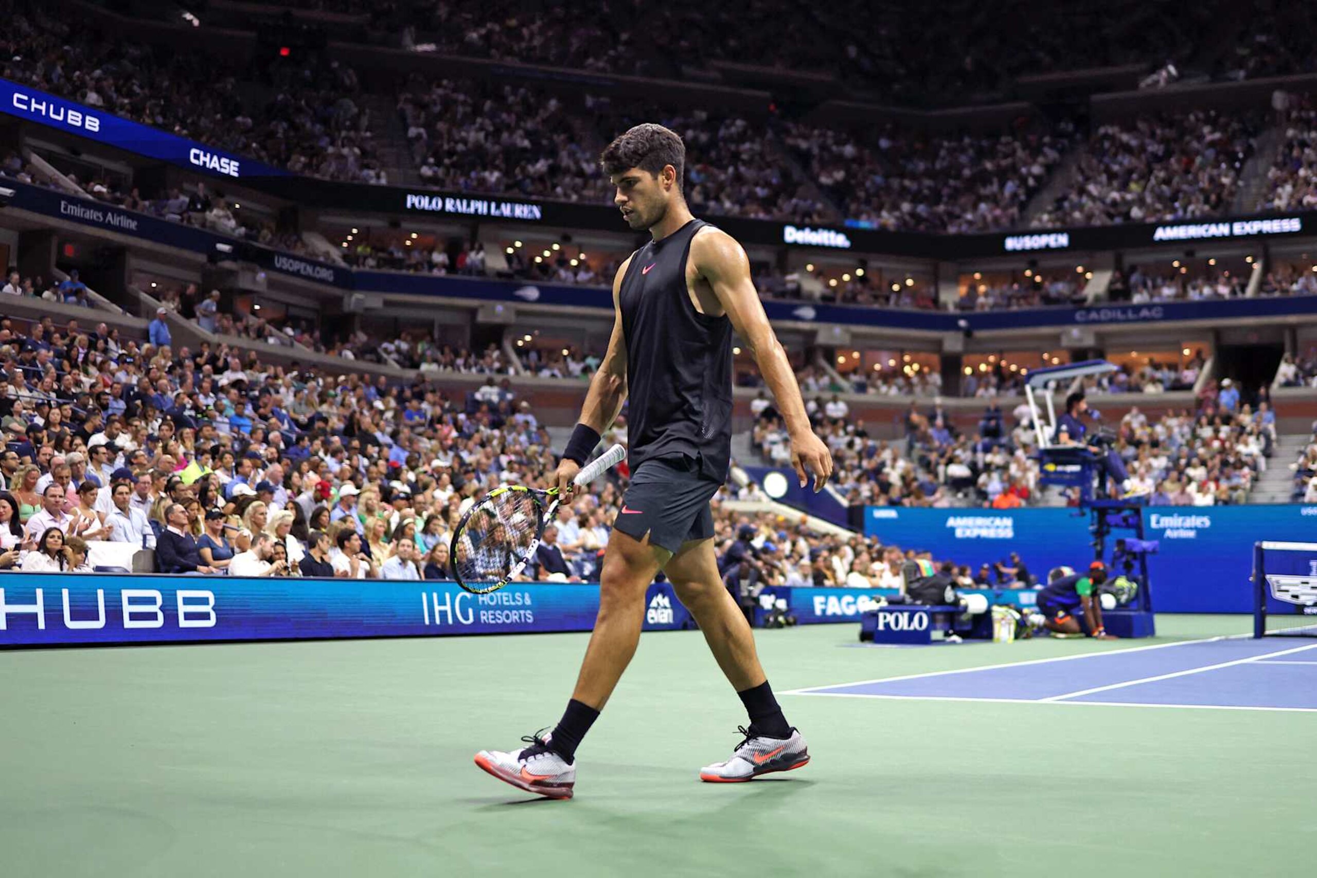 TOPSHOT - Spain's Carlos Alcaraz reacts following a point against Netherlands' Botic van De Zandschulp during their men's singles second round tennis match on day four of the US Open tennis tournament at the USTA Billie Jean King National Tennis Center in New York City, on August 29, 2024. (Photo by CHARLY TRIBALLEAU / AFP) (Photo by CHARLY TRIBALLEAU/AFP via Getty Images)