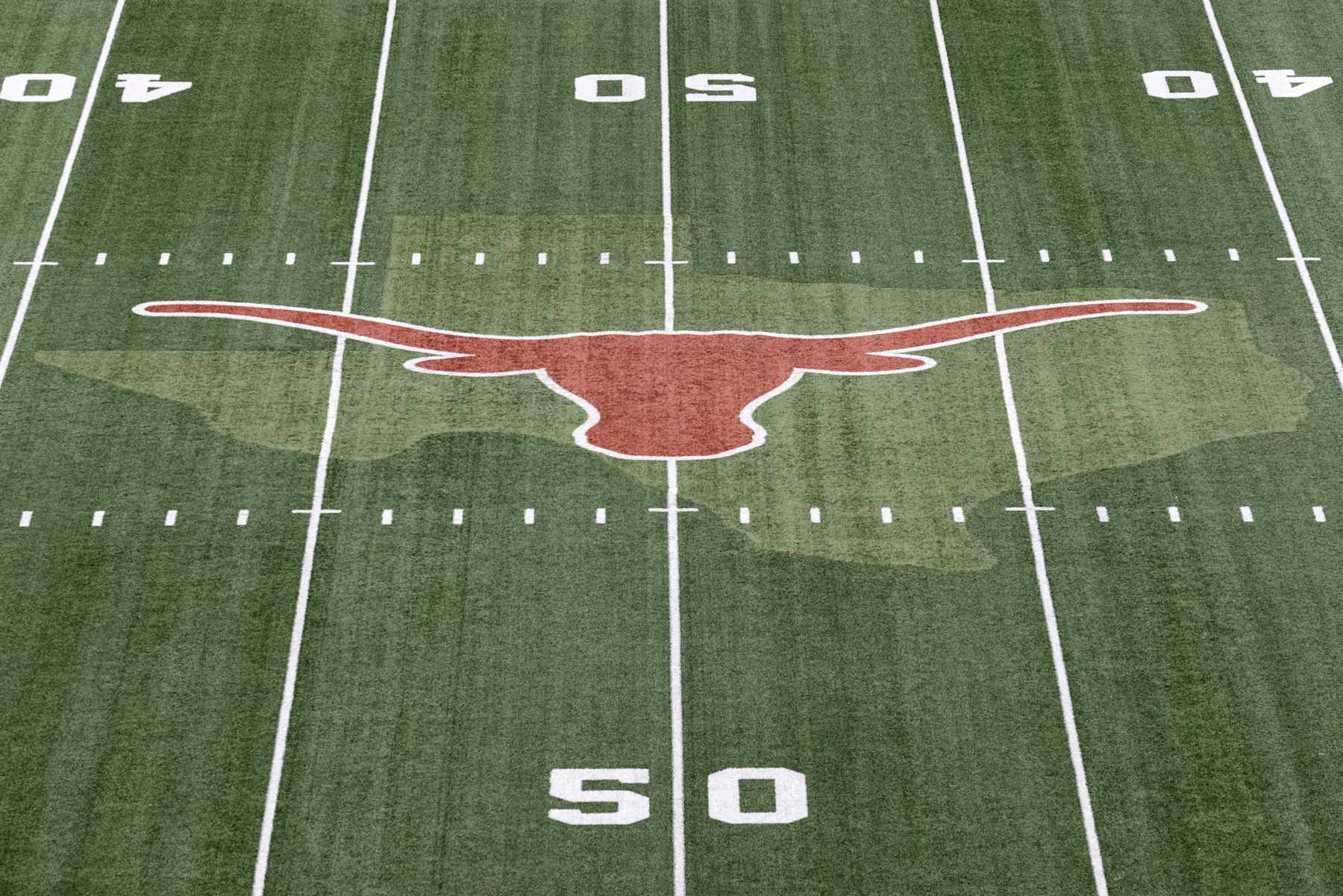 AUSTIN, TEXAS - SEPTEMBER 03: A view of the Texas Longhorns logo at midfield before the game \al at Darrell K Royal-Texas Memorial Stadium on September 03, 2022 in Austin, Texas. (Photo by Tim Warner/Getty Images)